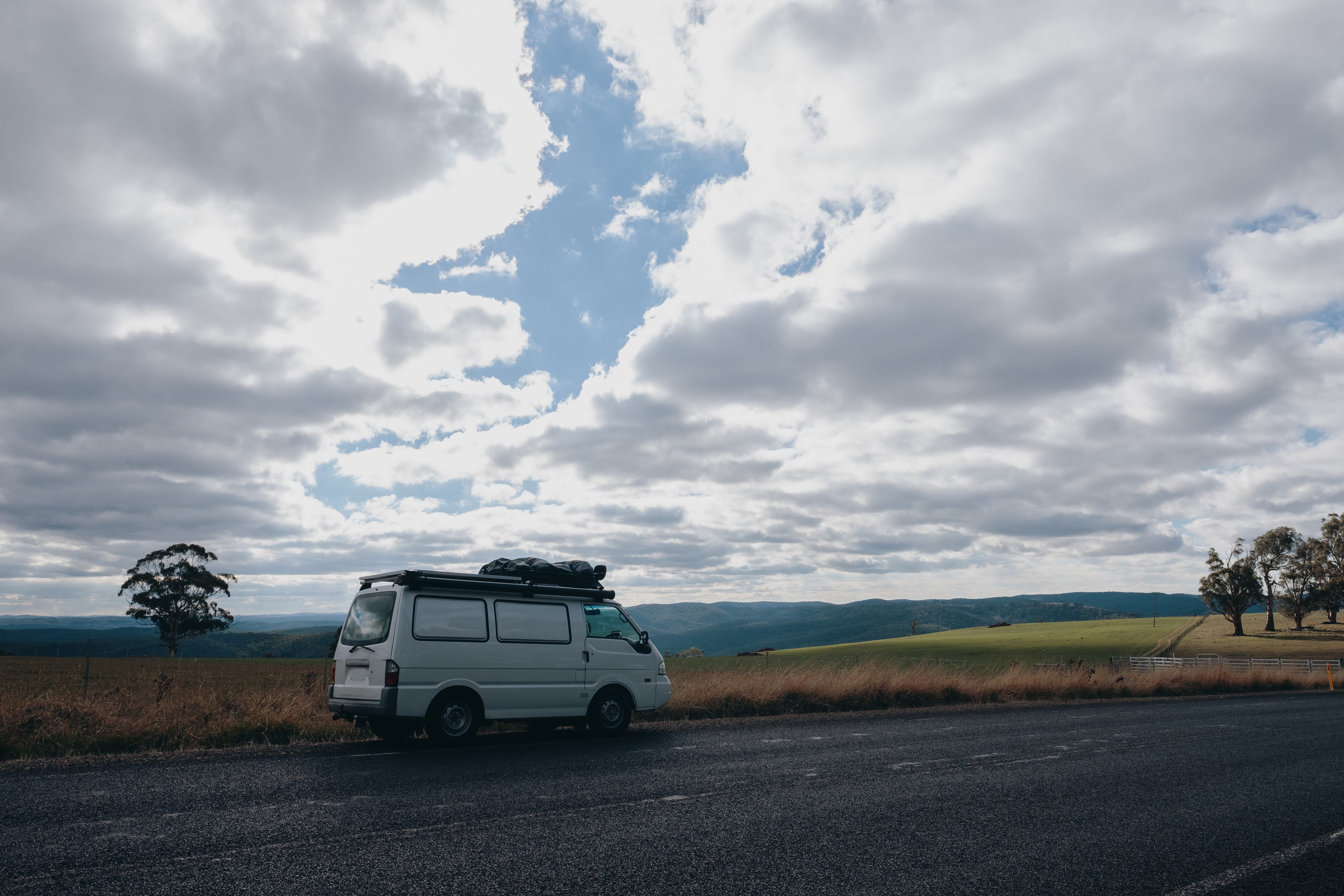 transportation, mode of transportation, land, street, day, land vehicle, 5K, road trip, cloud - sky, no people, car, outdoors, field, beauty in nature, HD Wallpaper