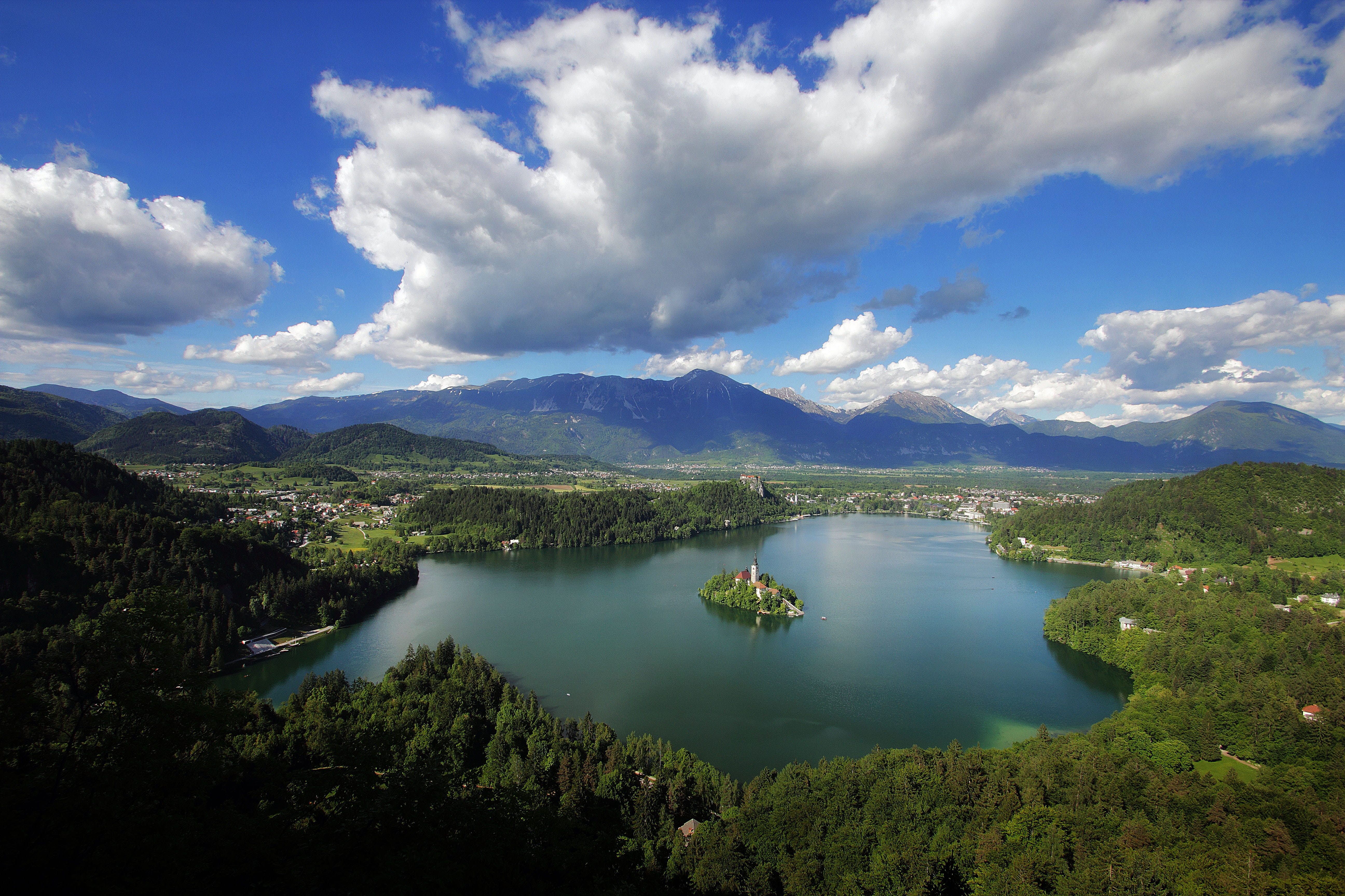 non-urban scene, island, bled, outdoors, nature, environment, water, 5K, day, mountain, lake bled, tranquility, lake, clouds, suny, mountain range, plant, HD Wallpaper