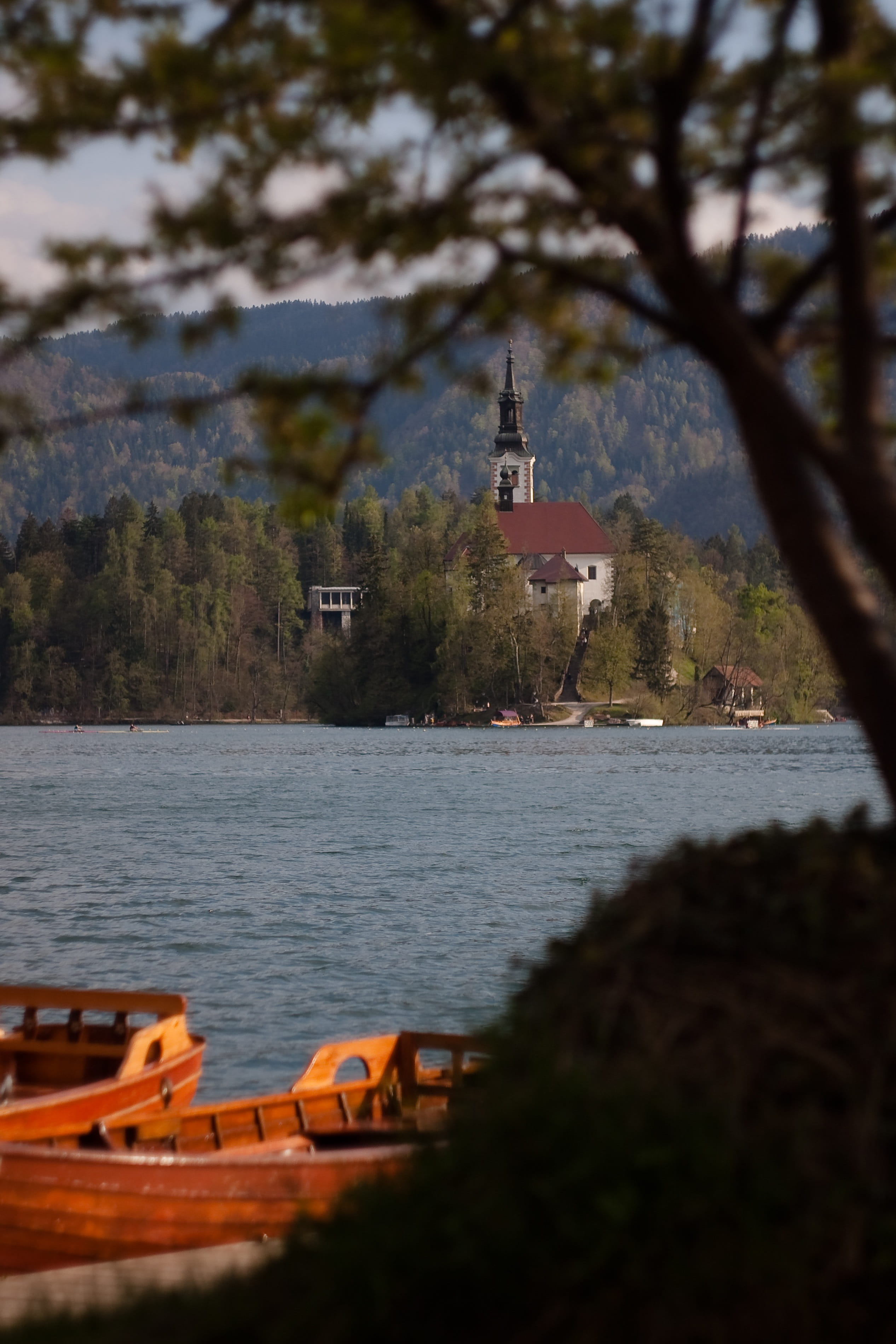 plant, slovenia, boat, building exterior, island, church, architecture, transportation, sky, protection, selective focus, 2K, dusk, outdoors, built structure, Phone HD Wallpaper