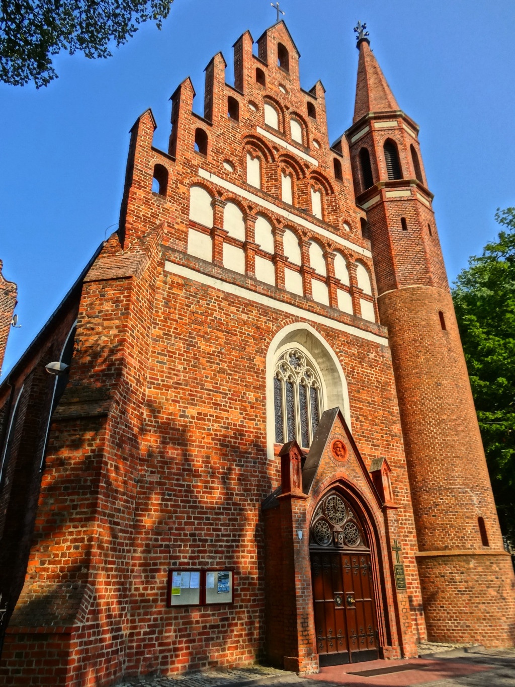 spirituality, bydgoszcz, gable, low angle view, facade, belief, outdoors, built structure, nature, arch, religious, sky, church, architecture, clock, day, Phone HD Wallpaper