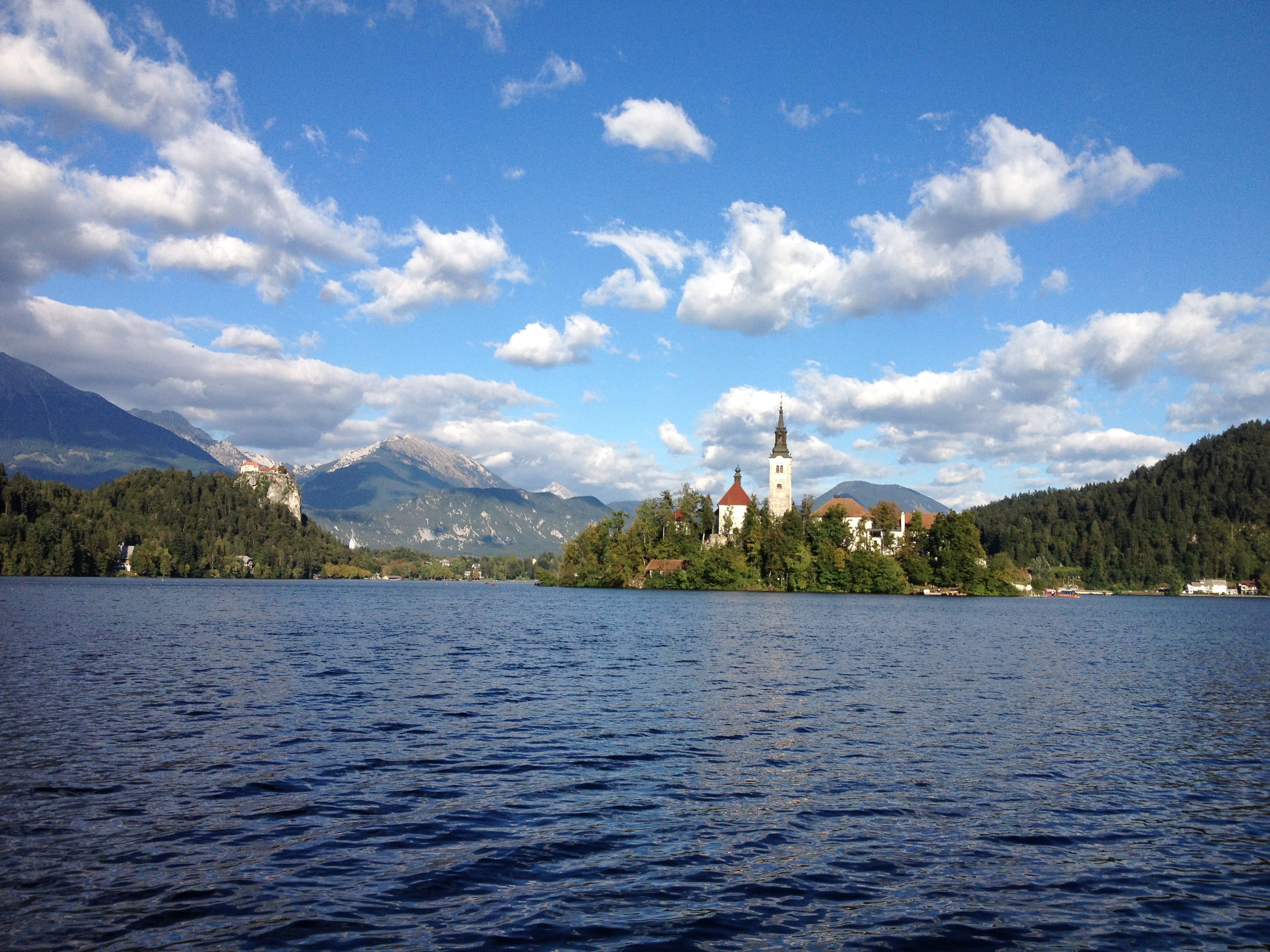 built structure, waterfront, scenics - nature, scenics, Travel, cloud - sky, day, sky, 2K, outdoors, bled, tranquility, lake, architecture, nature, building exterior, HD Wallpaper