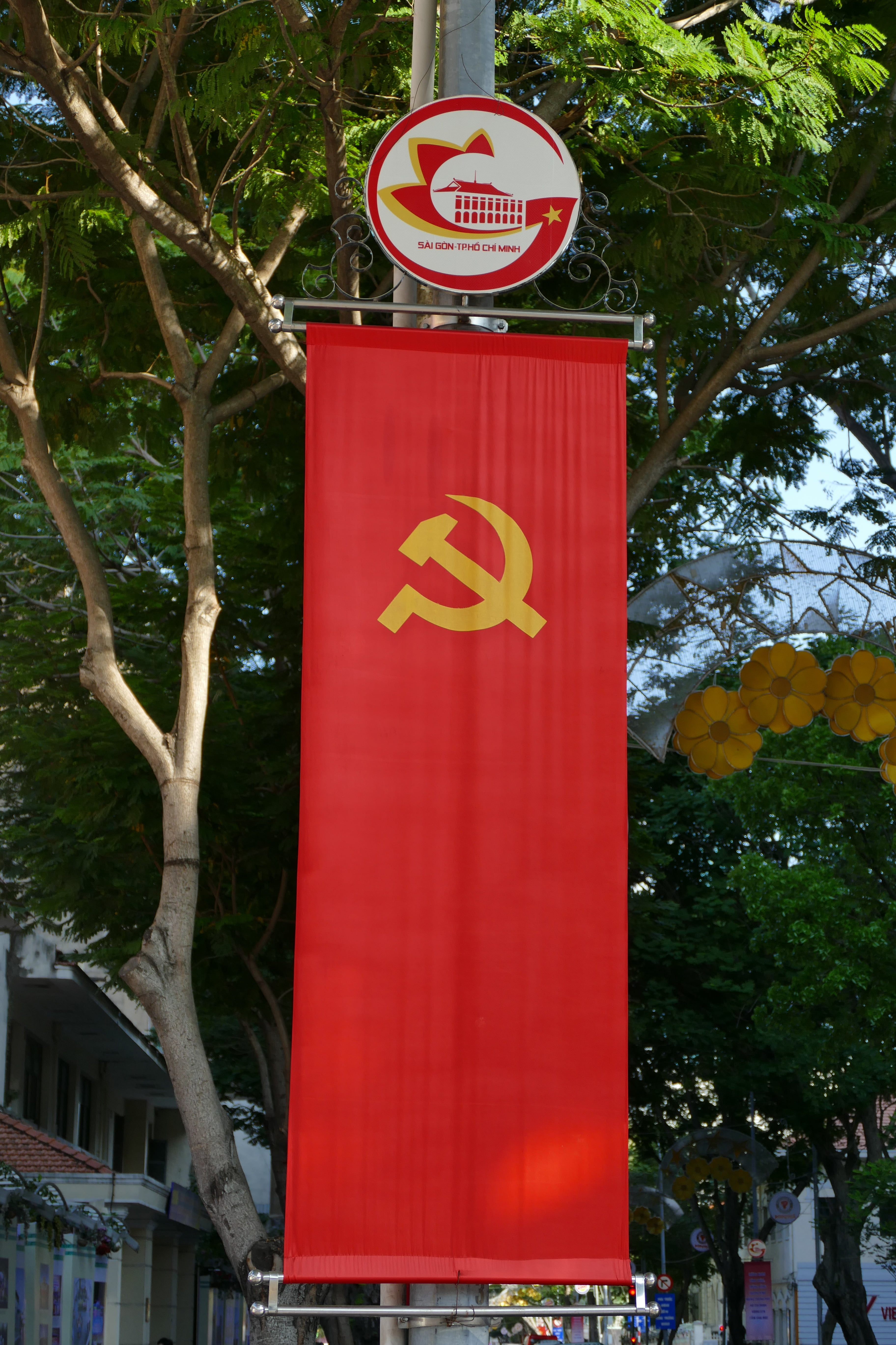 saigon ho chi minh city, communism, vietnam, guidance, plant, communication, stop sign, red, flag, 5K, information sign, day, outdoors, warning sign, western script, Phone HD Wallpaper