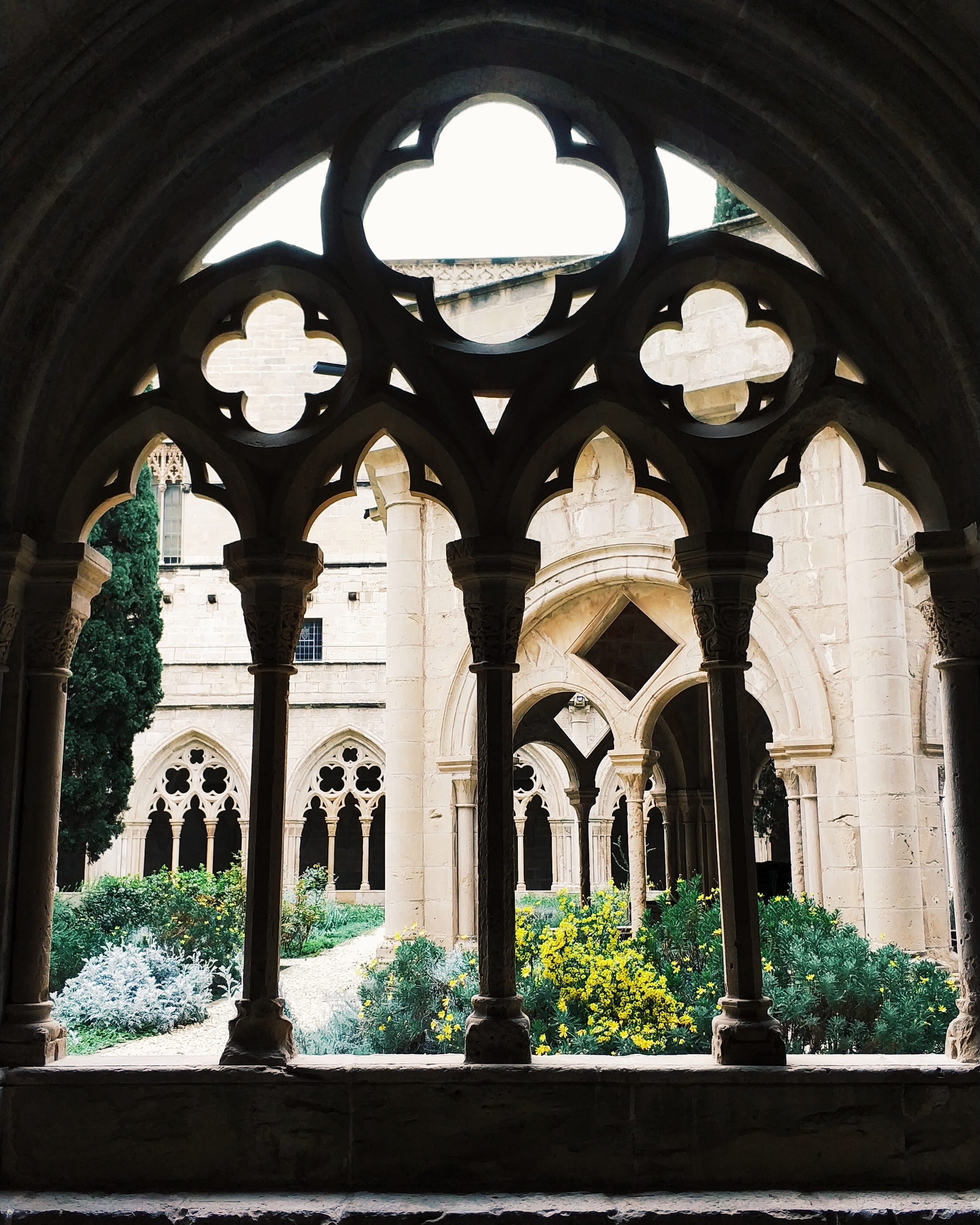 spire, tower, architecture, built structure, courtyard, building, monasterio, arched, garden, ornate, porch, corridor, crypt, day, religion, 2K, no people, Phone HD Wallpaper