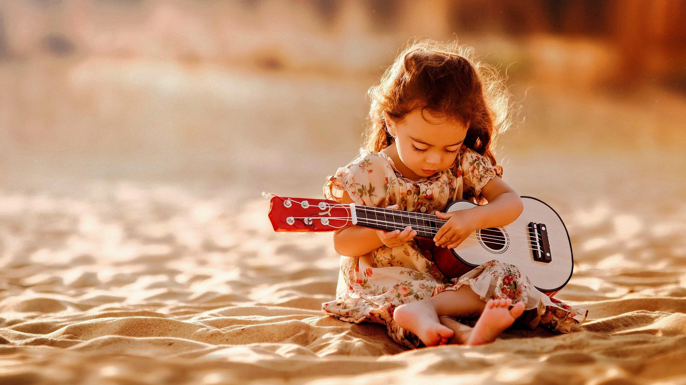 innocence, fun, sand, photography, offspring, child, beach, sunlight, music, full length, childhood, musical instrument, children, sitting, 2K, land, enjoyment, HD Wallpaper