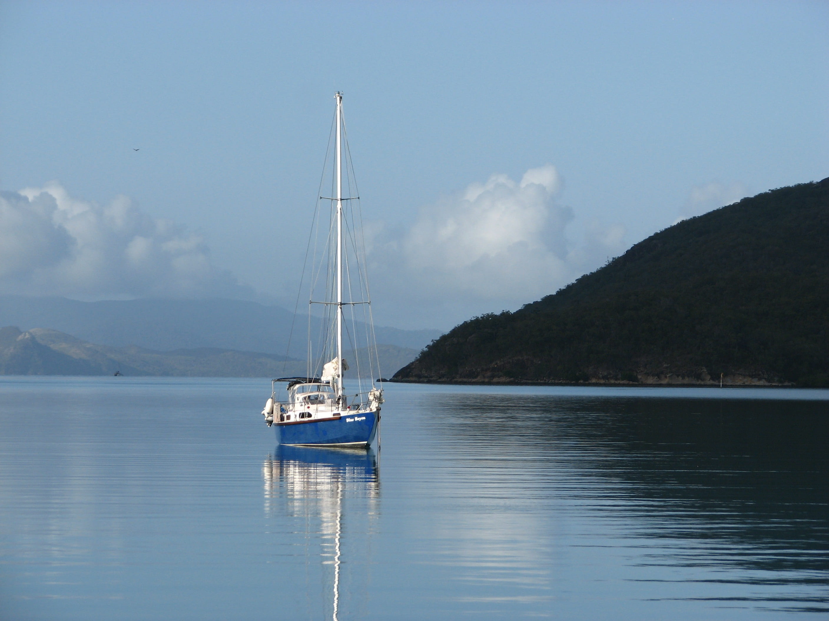 mountain, luxury, sailing ship, cloud - sky, water, travel, Whitsunday Islands, nautical vessel, mast, no people, mode of transportation, sea, anchored, HD Wallpaper