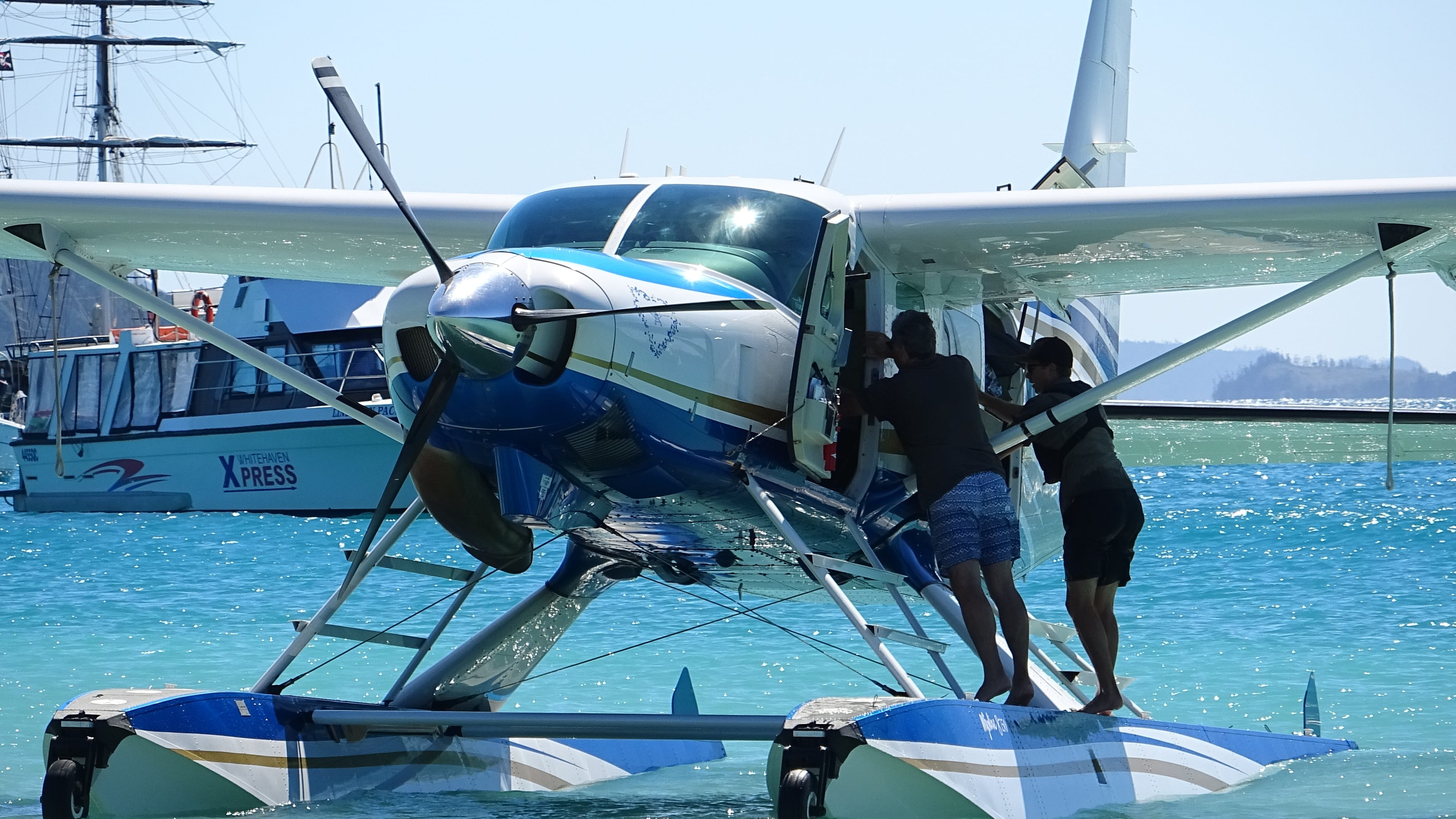 nautical vessel, travel, seaplane, transportation, sunlight, day, sea, white heaven beach, clear sky, australia, 4K, lifestyles, real people, nature, sky, HD Wallpaper