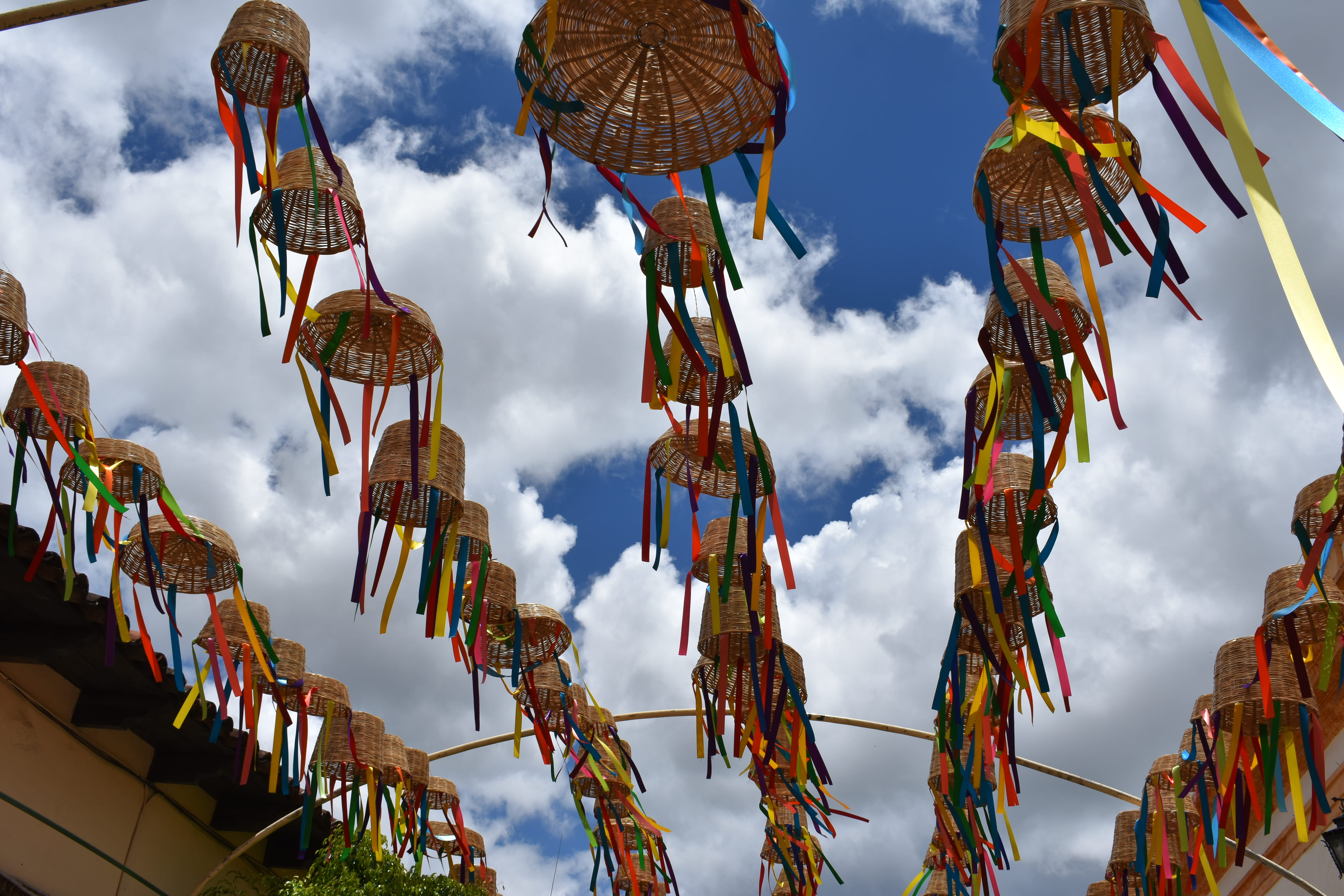 low angle view, colors, day, hanging, outdoors, belief, nature, religion, side by side, spirituality, cielo, sky, decoration, cloud - sky, place of worship, HD Wallpaper