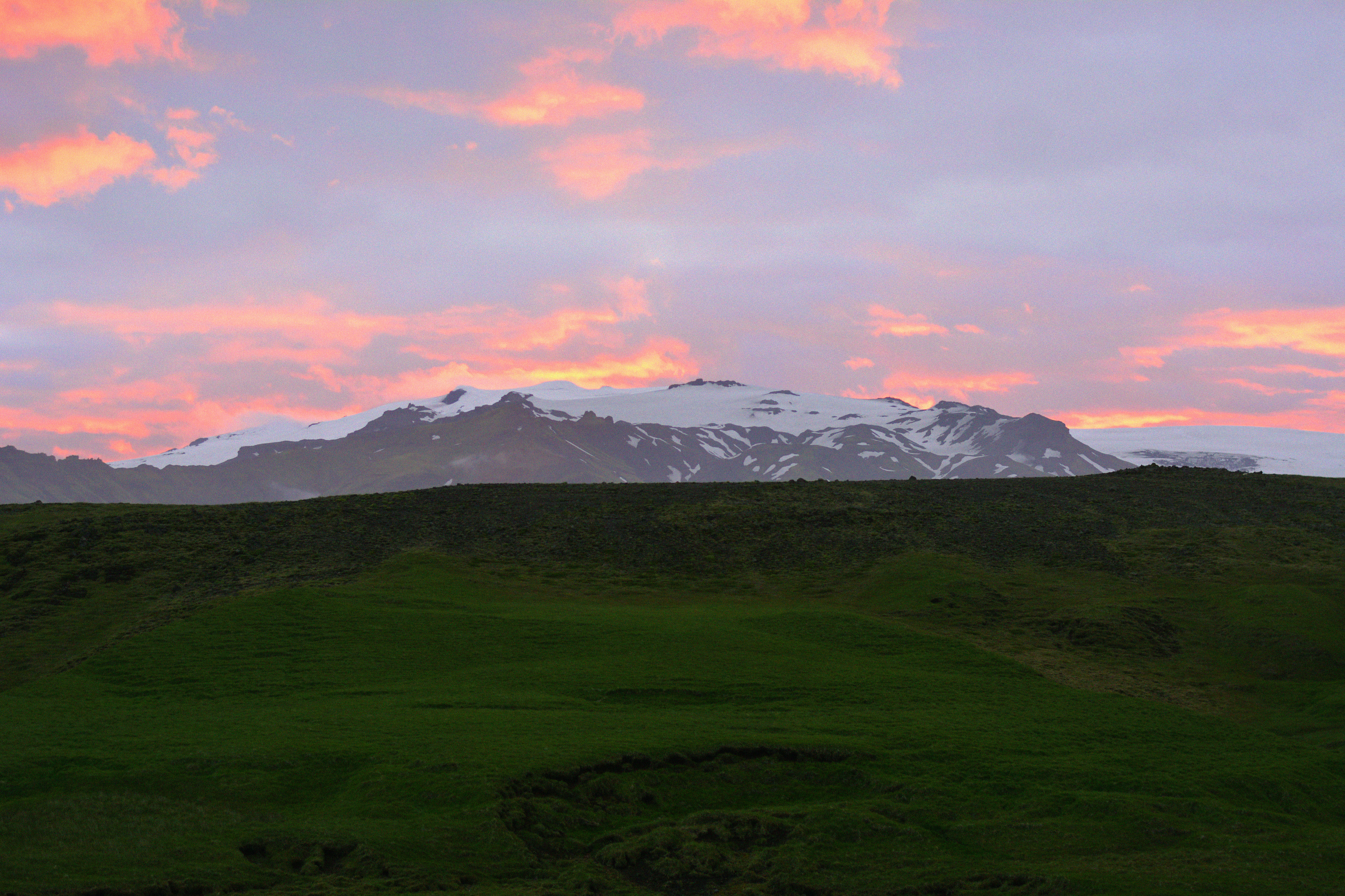 mountain peak, non-urban scene, tranquil scene, snow, skógafoss, sunset, tranquility, snowcapped mountain, grass, midnight sun, mountain, no people, cloud - sky, HD Wallpaper