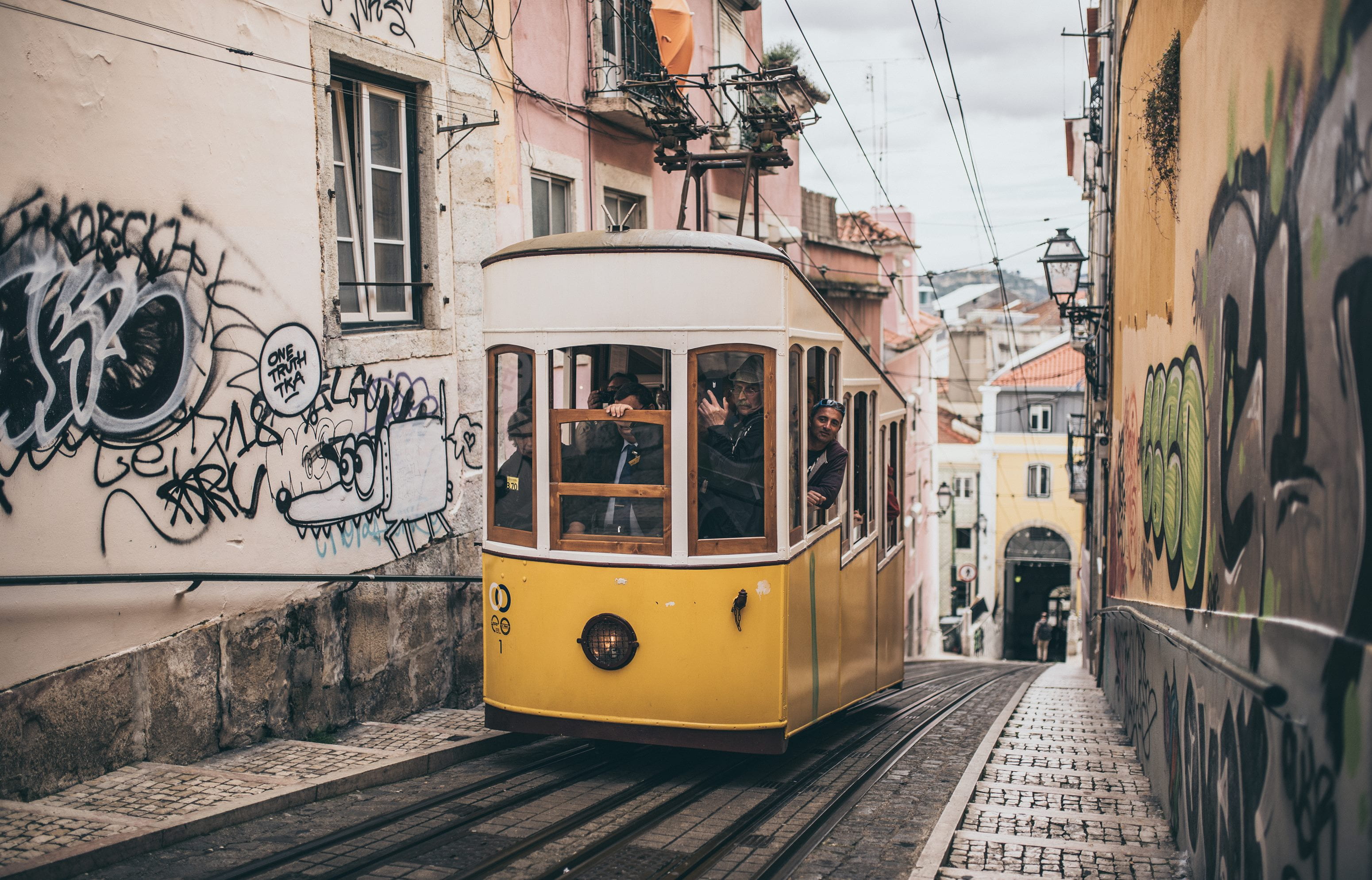 cable car, city, transportation, railroad track, white, cable, track, graffiti, concrete, alley, public transportation, brown, buildings, outdoors, yellow, HD Wallpaper