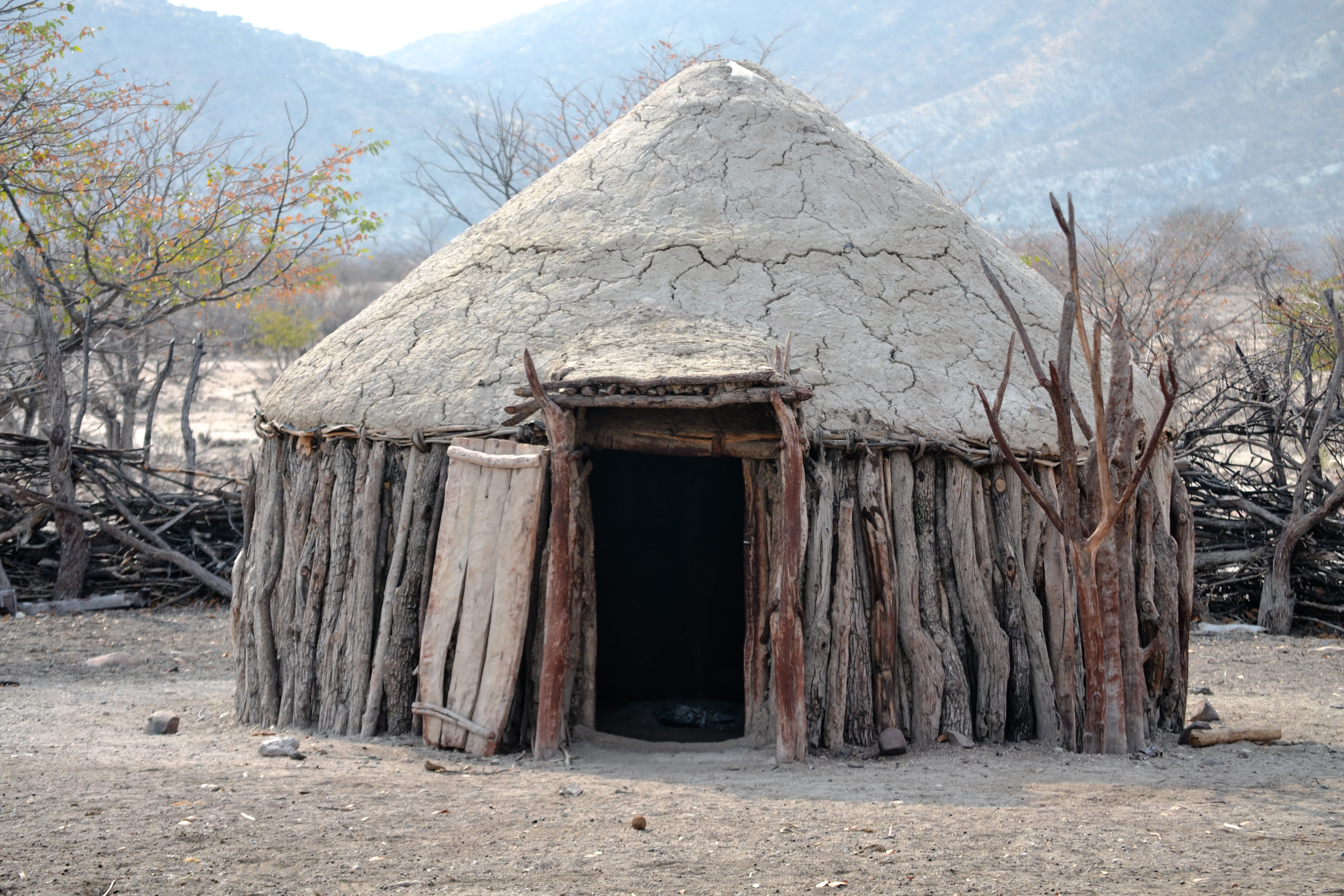 entrance, 4K, africa, house, ancient civilization, plant, hut, no people, building exterior, day, house himba, history, architecture, outdoors, mountain, HD Wallpaper