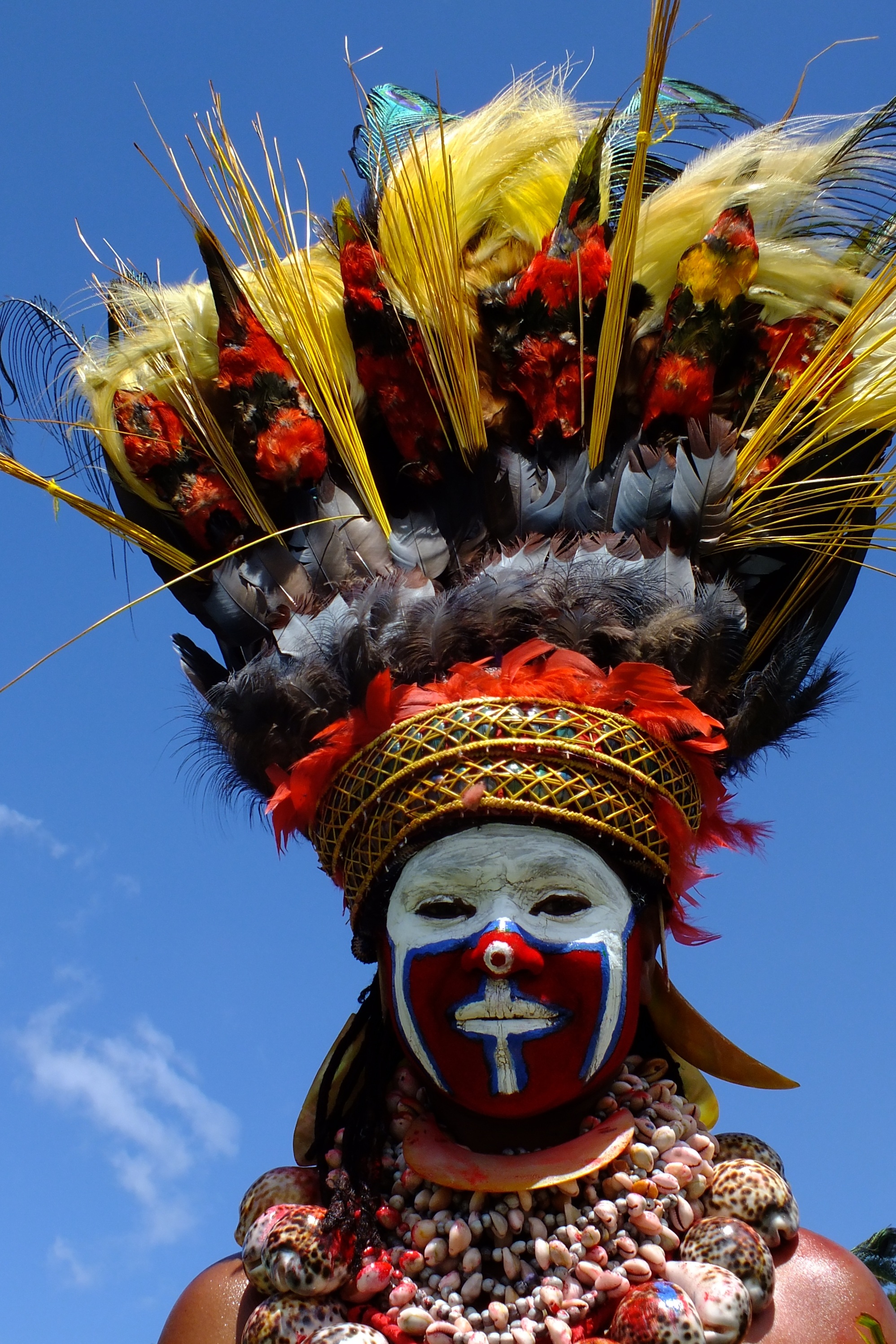 low angle view, sky, tribal, white, beads, one person, papua new guinea, person, outdoors, day, feathers, nature, wearing, art and craft, human representation, Phone HD Wallpaper