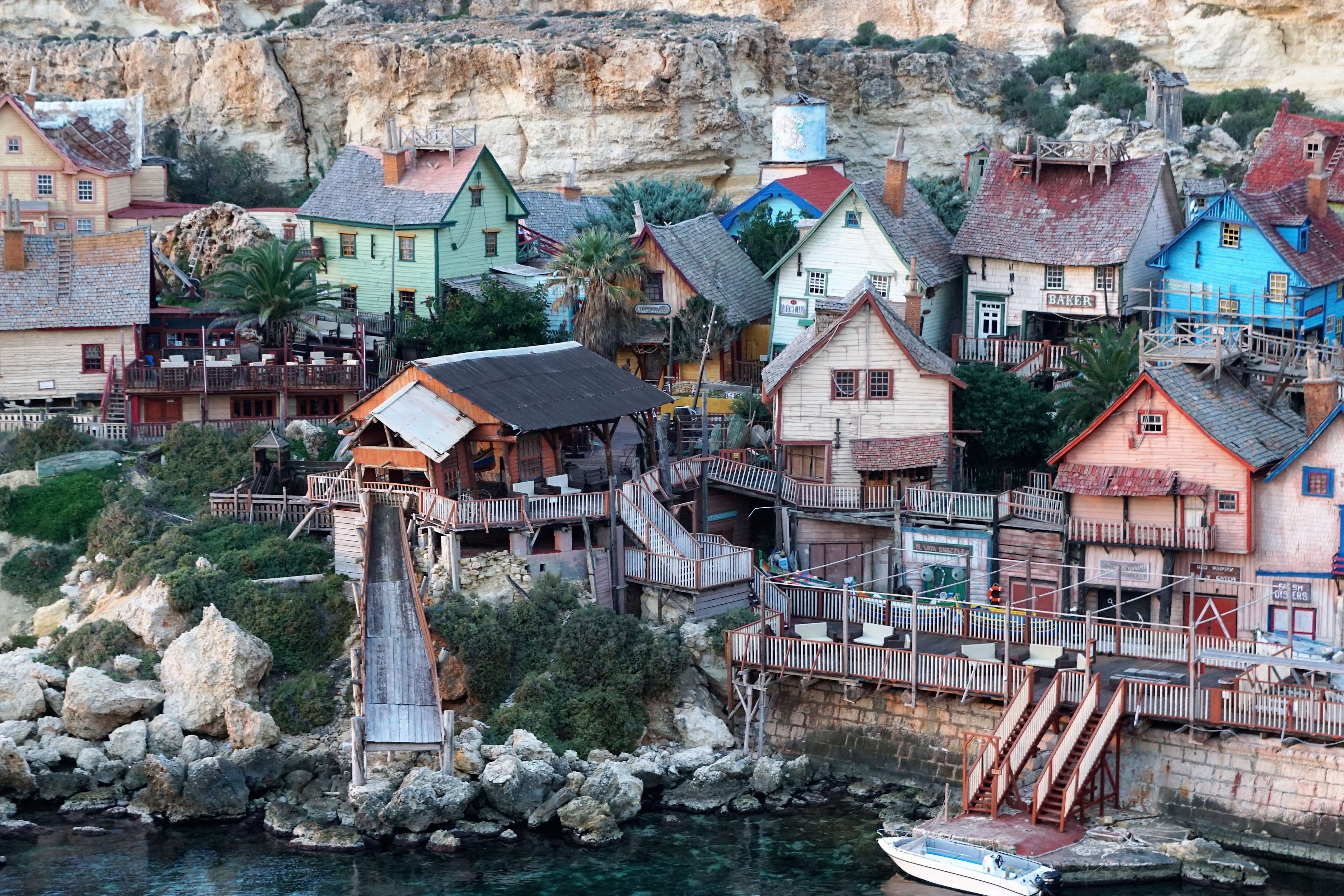4K, location, popeye village, water, film, bridge, booked, city, anchor bay, outdoors, built structure, town, roof, building, village, home, house, rustic, HD Wallpaper