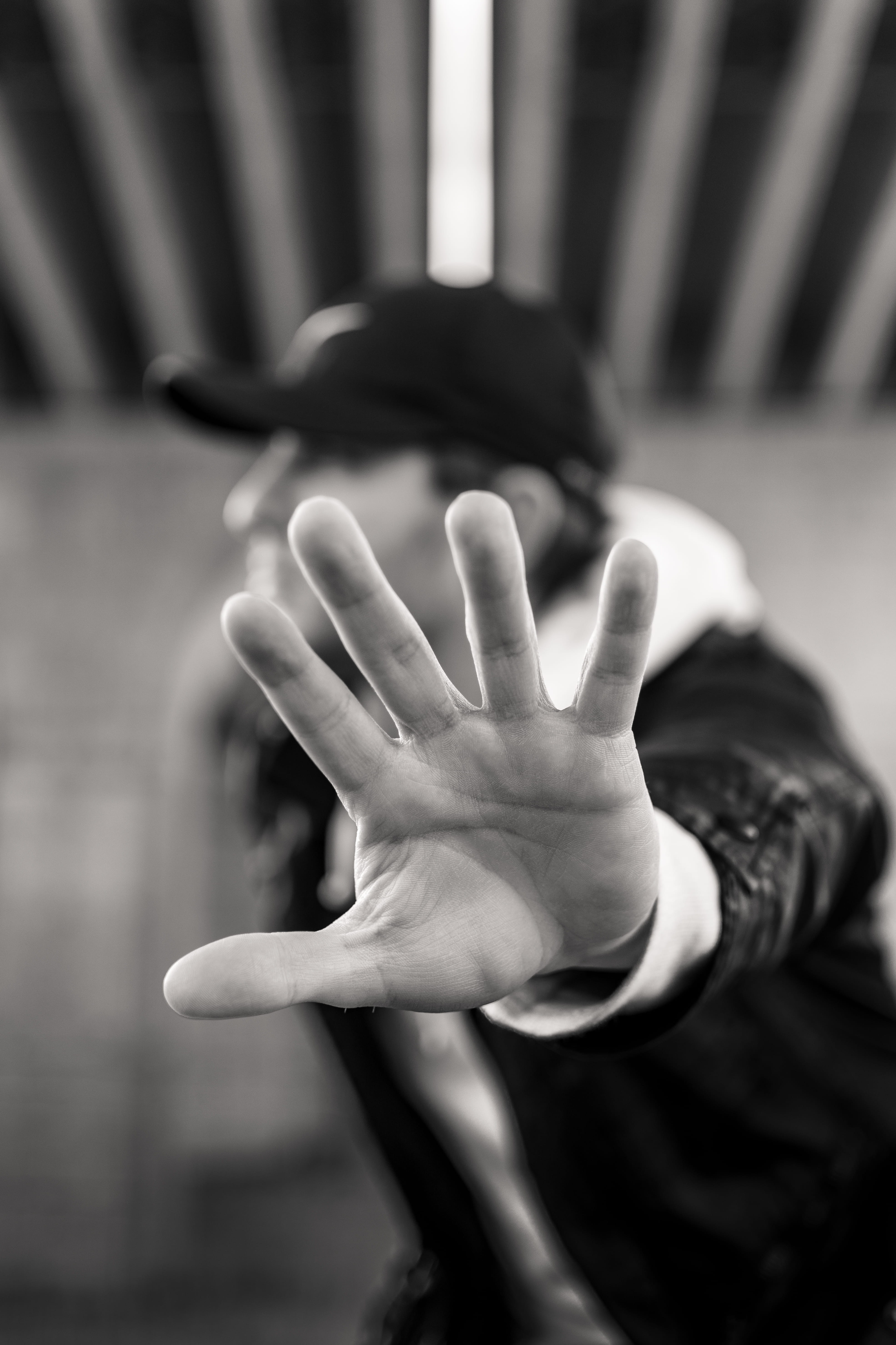 cap, monochrome, body part, grayscale, stop gesture, photo, hand raised, portrait, human arm, blur, child, finger, depth of field, gesturing, human hand, Phone HD Wallpaper