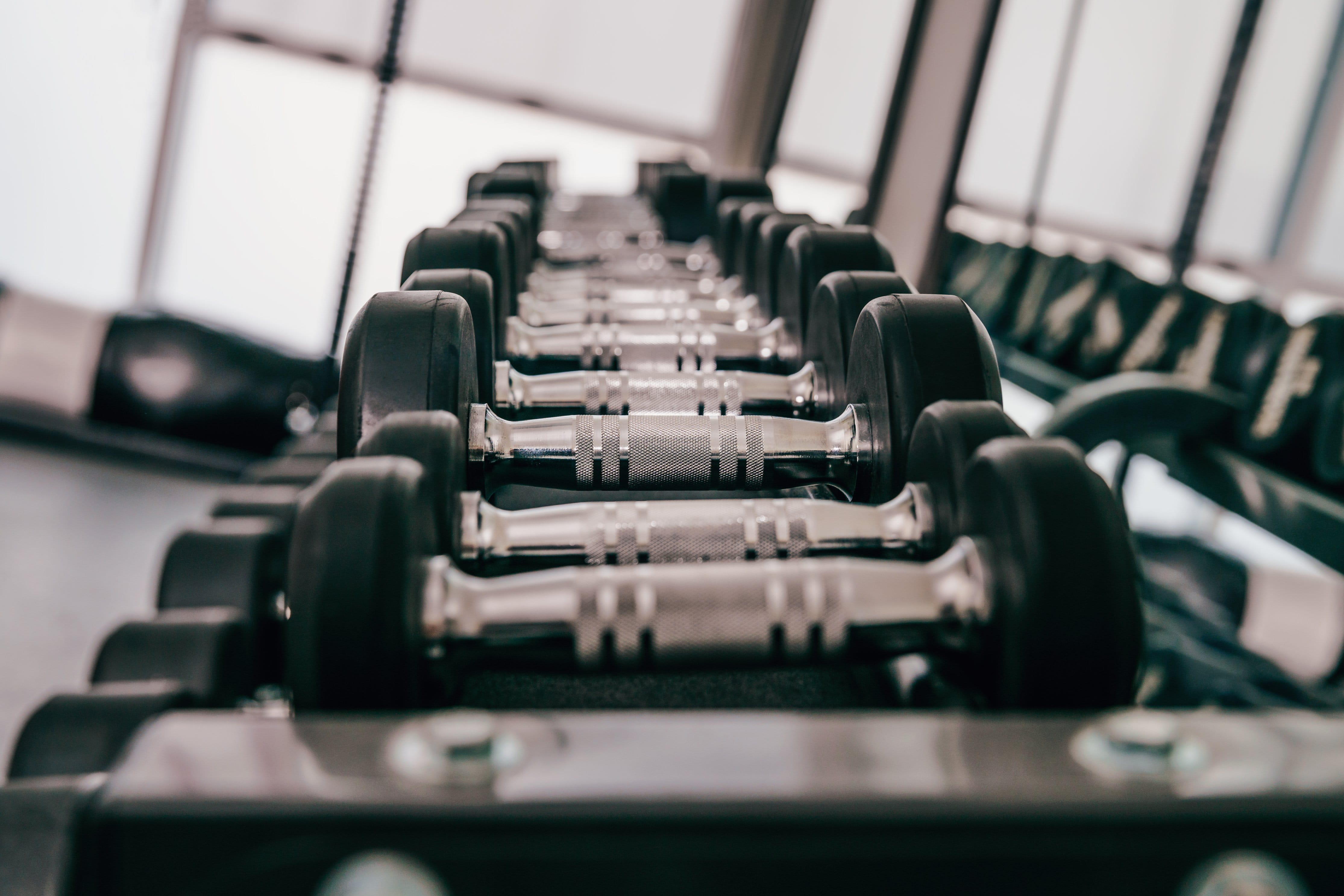 selective focus, order, photo, no people, chair, movie theater, repetition, Gym, 4K, day, in a row, auditorium, Fitness, large group of objects, weights, HD Wallpaper