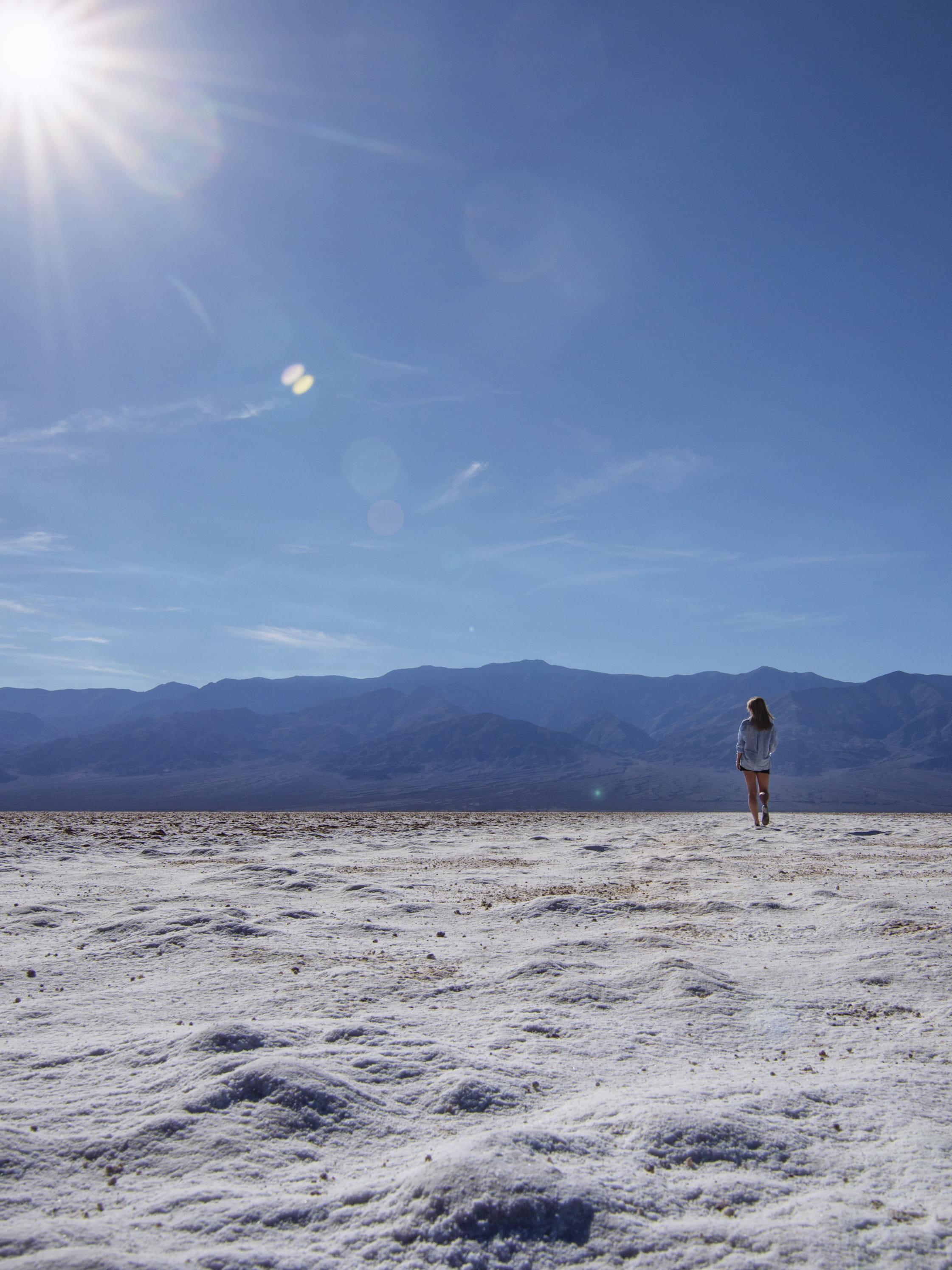one person, desert, salt plains, tranquility, death valley, lens flare, sun, leisure activity, beauty in nature, scenics - nature, environment, girl, land, Phone HD Wallpaper
