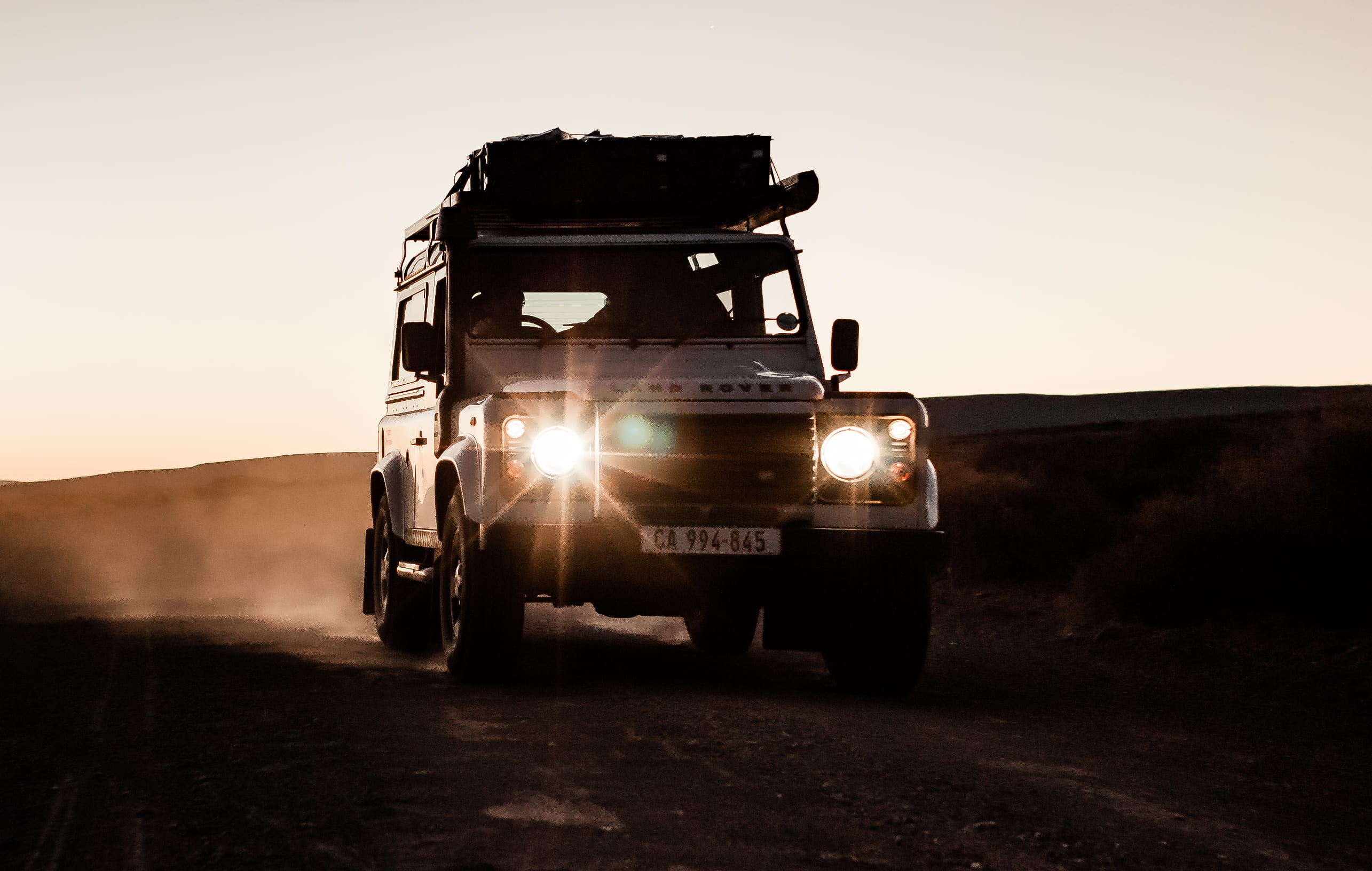 4x4, motion, rover, dusk, suv, driving, silver, desert, headlights, discover, land vehicle, transportation, contrast, explore, drive, silhouette, landscape, HD Wallpaper