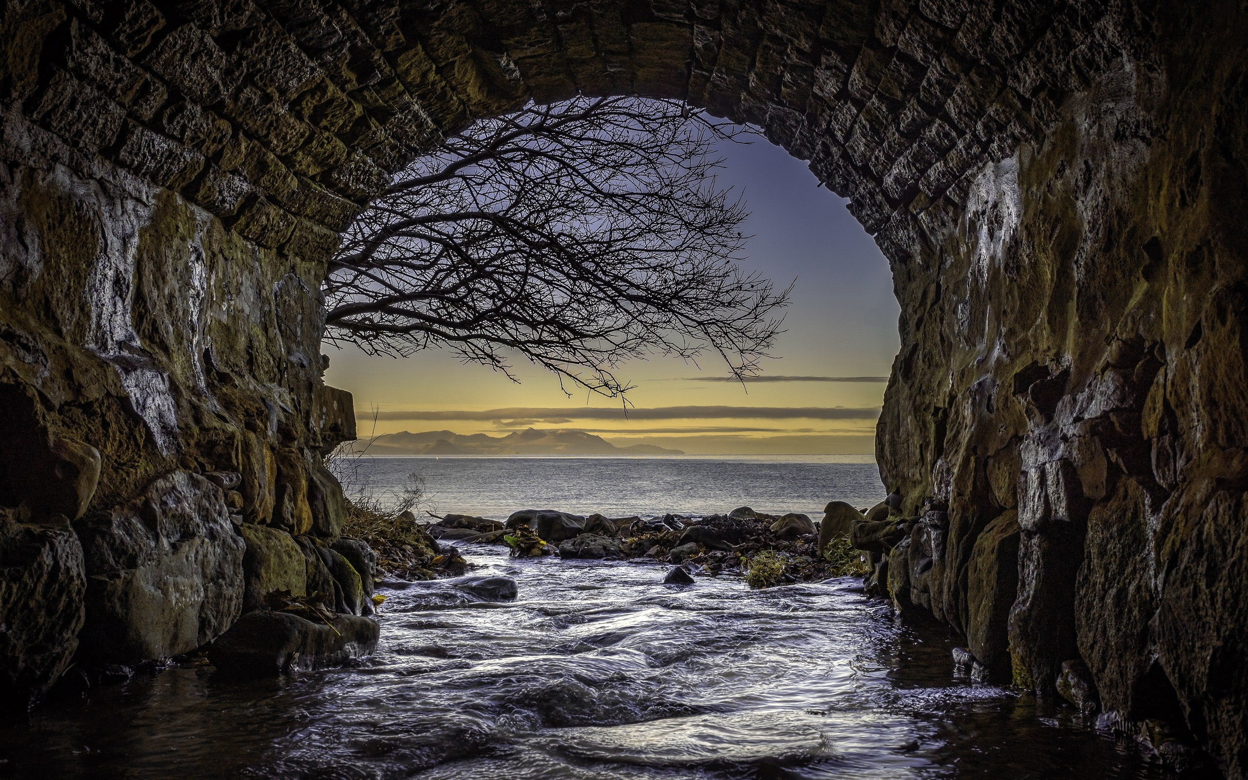 bridge, rock - object, tree, solid, no people, tunnel, outdoors, beach, tranquility, scenics - nature, sunset, rock, tranquil scene, Scotland, 2K, horizon over water, HD Wallpaper