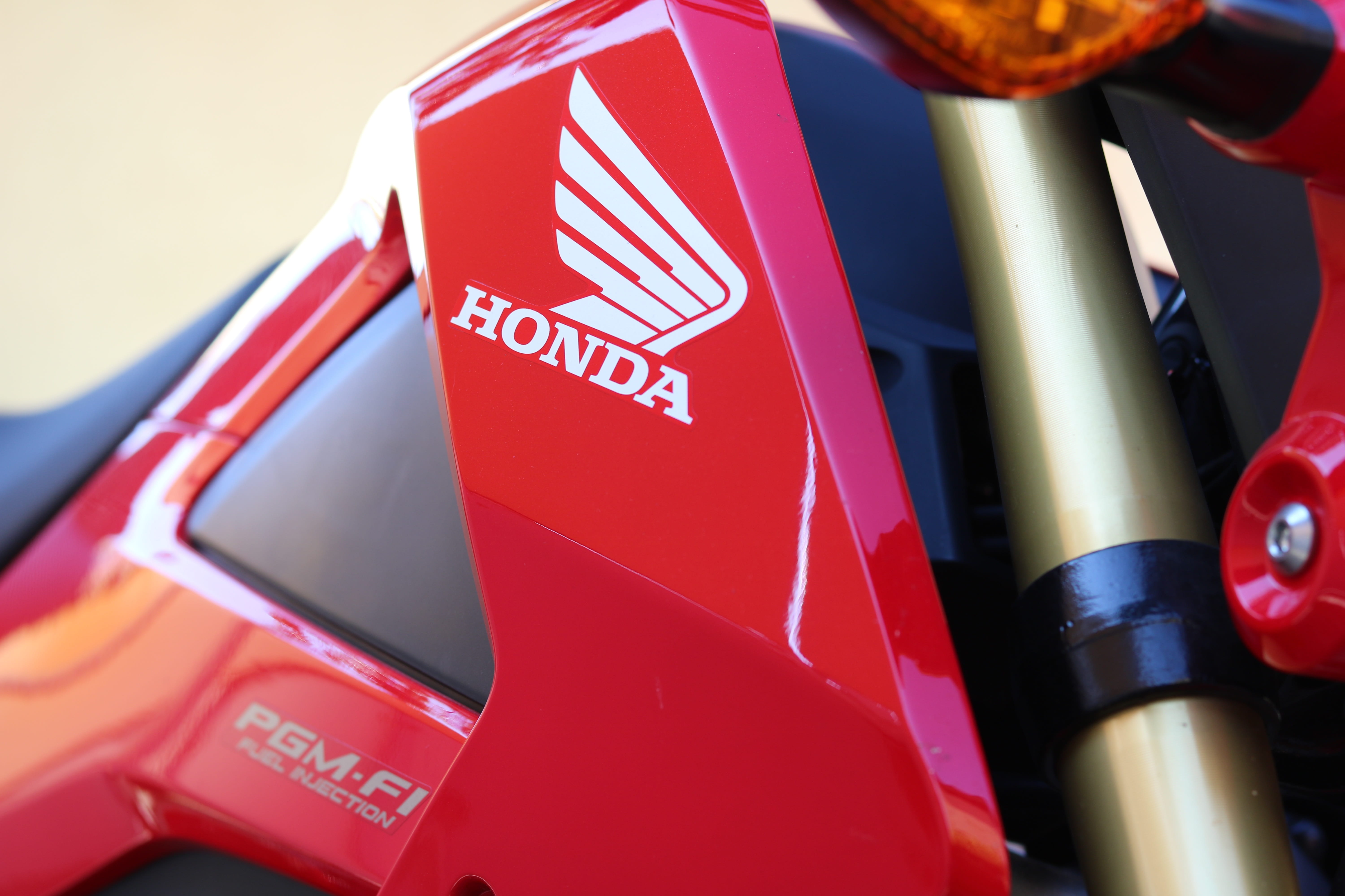 small group of objects, communication, honda, aggressive, mode of transportation, fork, 125cc, land vehicle, close-up, text, motor vehicle, red, fuel and power generation, HD Wallpaper