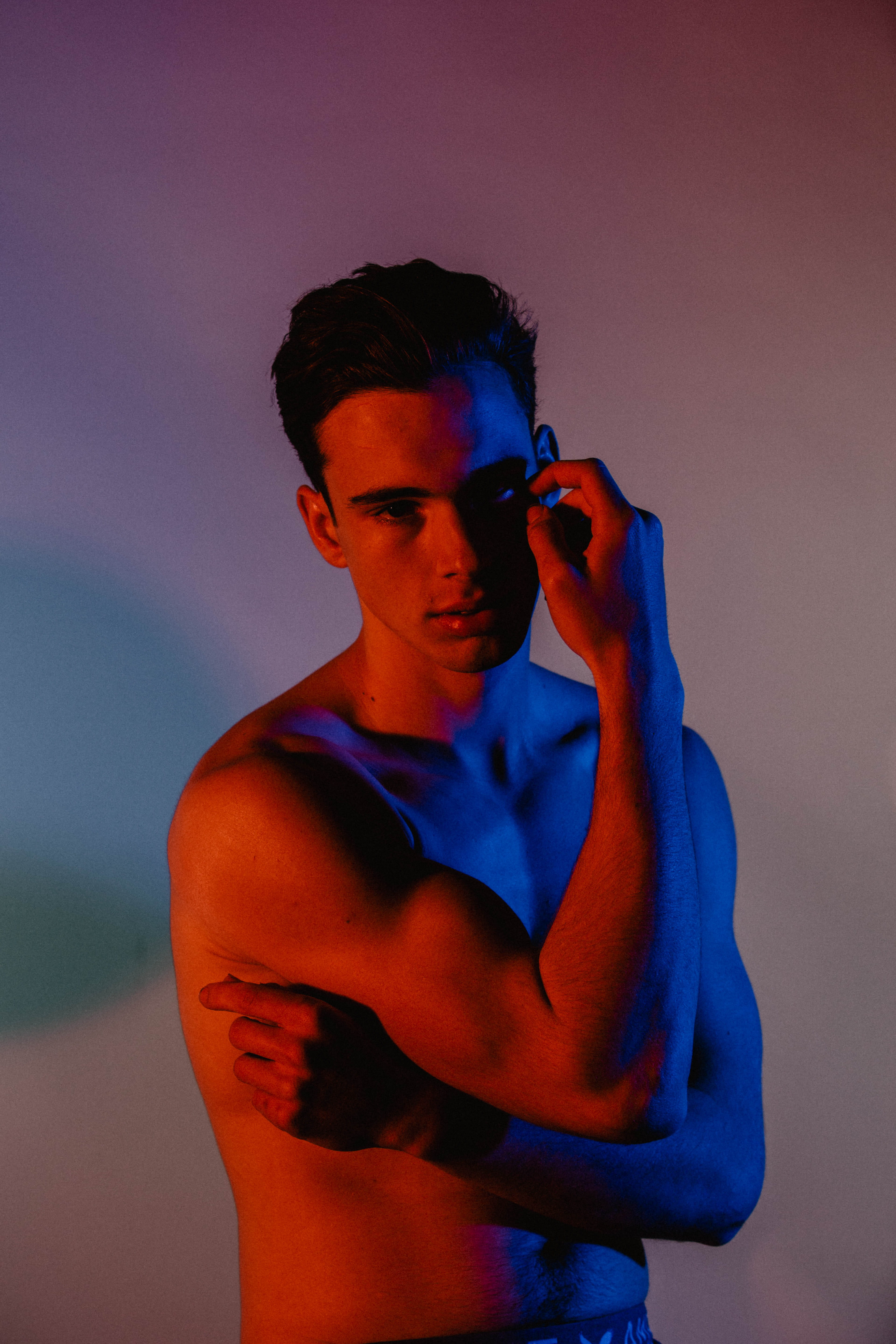 indoor, indoors, shirtless, three quarter length, young adult, blue, raising, guy, 5K, male, hand, bicep, leisure activity, casual clothing, young, facing camera, Phone HD Wallpaper