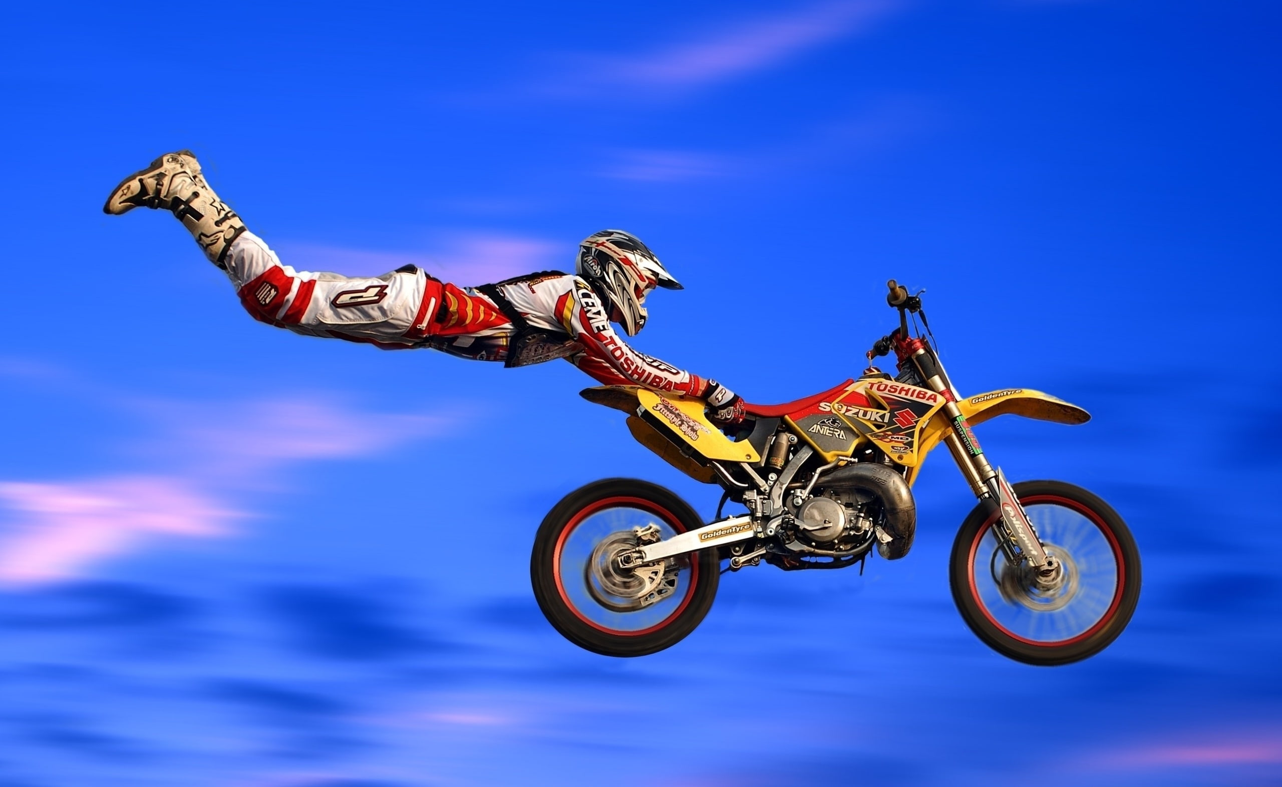human limb, competition, yellow, dirt, sport, skill, jumping, mid-air, Jumps, Motorcycle Racing, risk, human arm, bike, blue, sky, full length, red, one person, HD Wallpaper