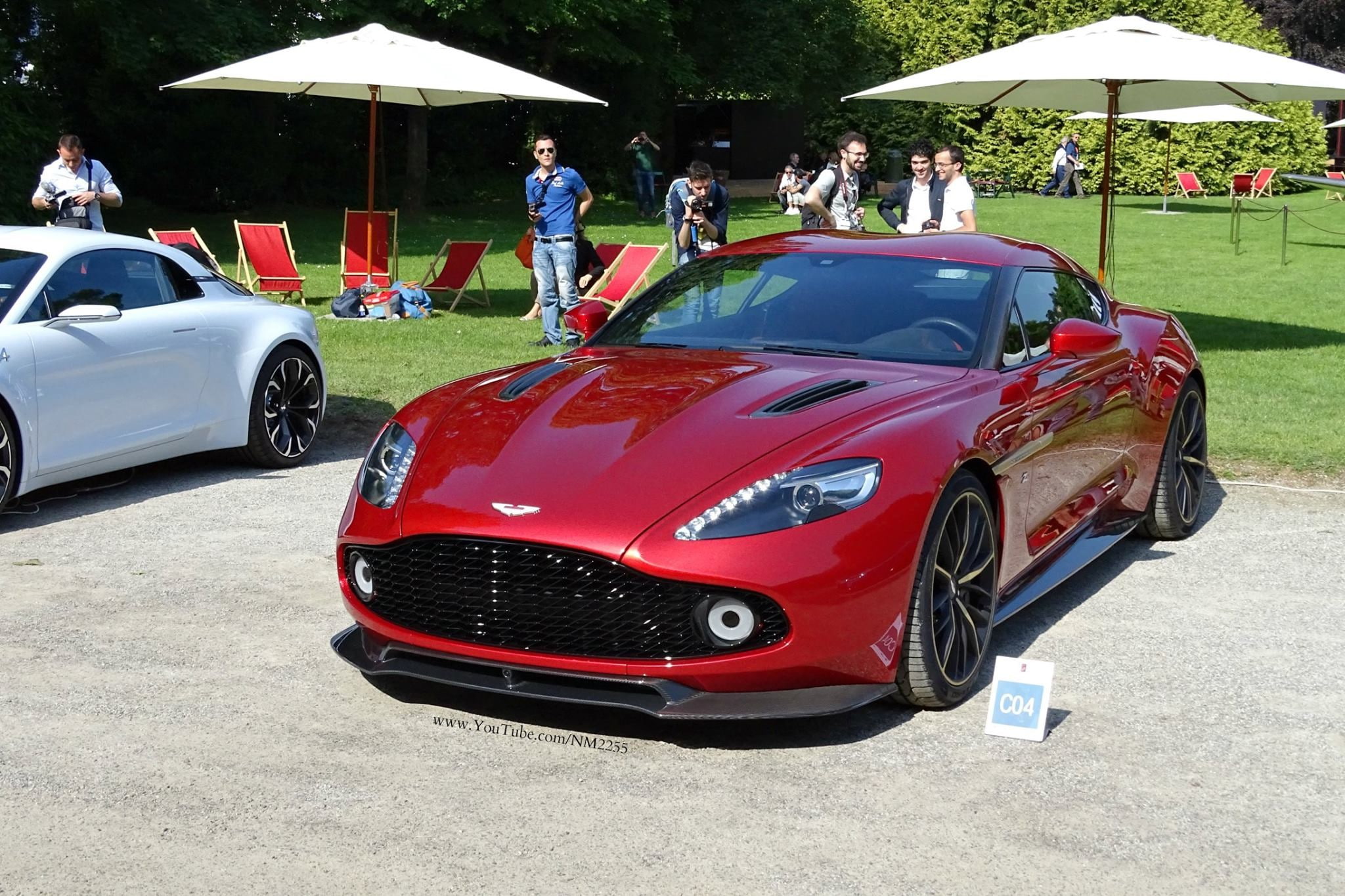 incidental people, Aston Martin Vanquish Zagato Concept, red, park, real people, sports car, motor vehicle, English cars, photographer, umbrella, transportation, HD Wallpaper