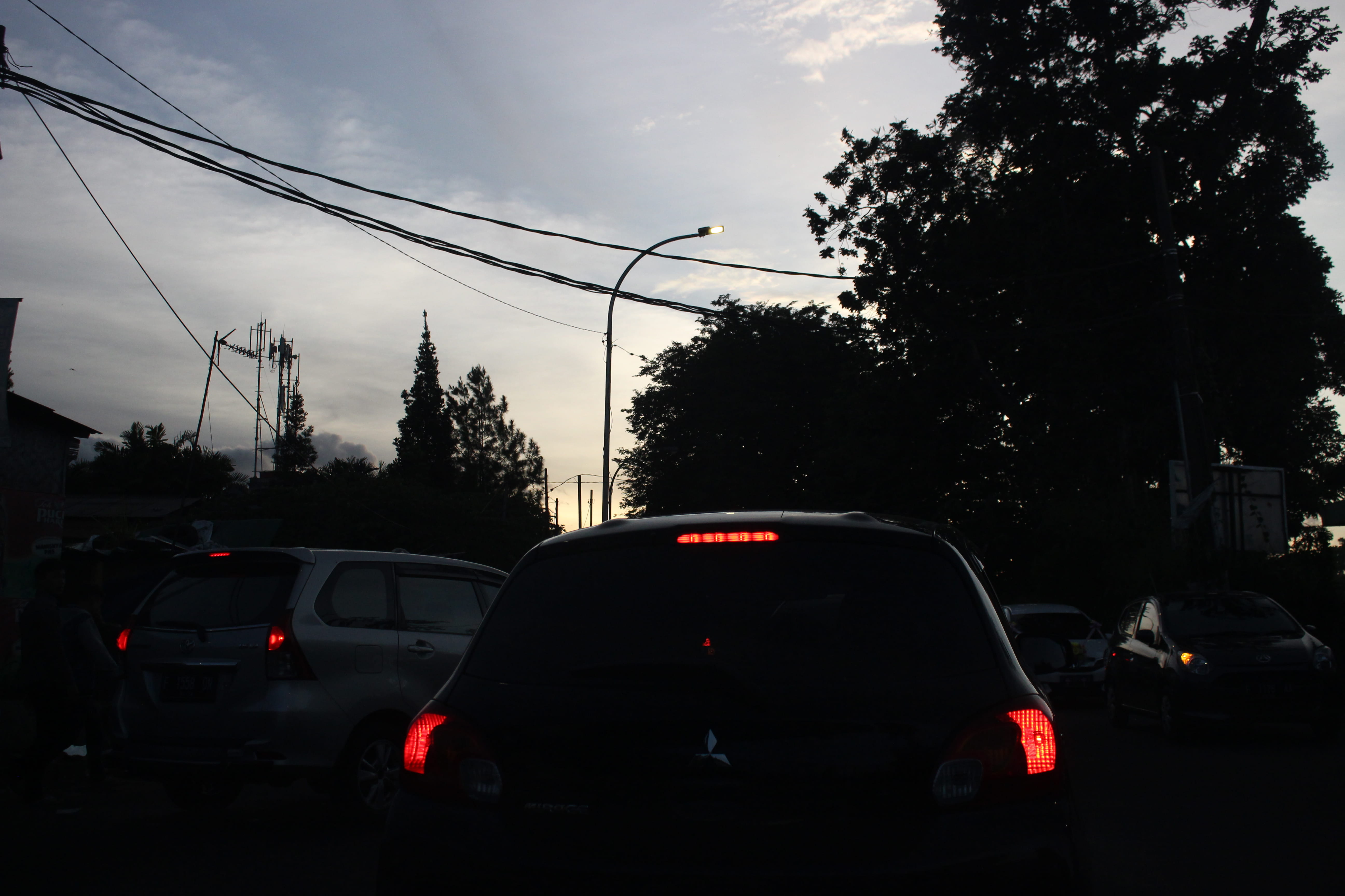 street, silhouette, outdoors, morning, land vehicle, crowded, car, vibes, indonesia, tail light, no people, electricity, mode of transportation, cloud - sky, HD Wallpaper