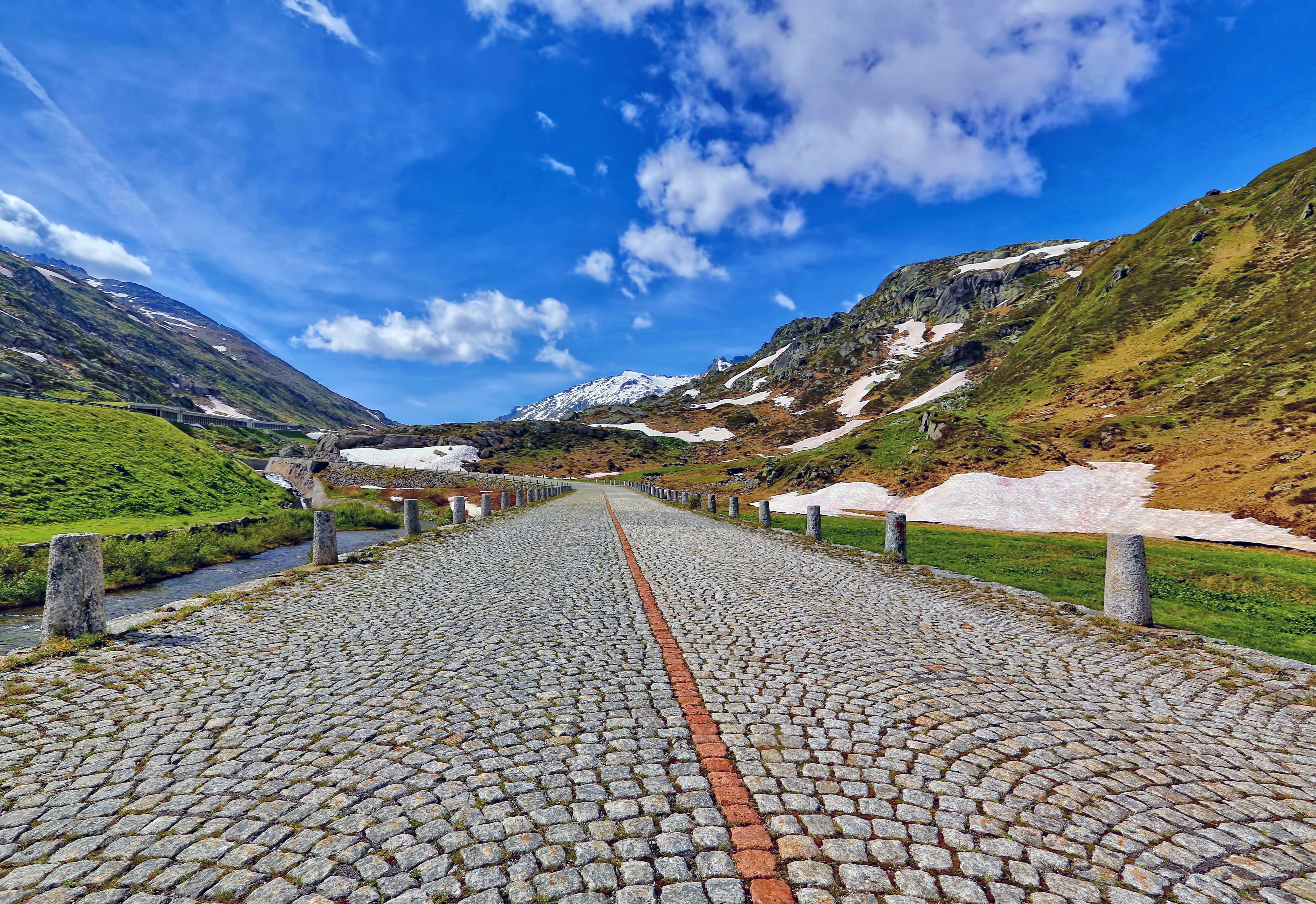 day, nature, pave, vanishing point, stone, the way forward, grass, cloud - sky, direction, spring, mountain, road, cloud, river, gotthard pass, beauty in nature, HD Wallpaper