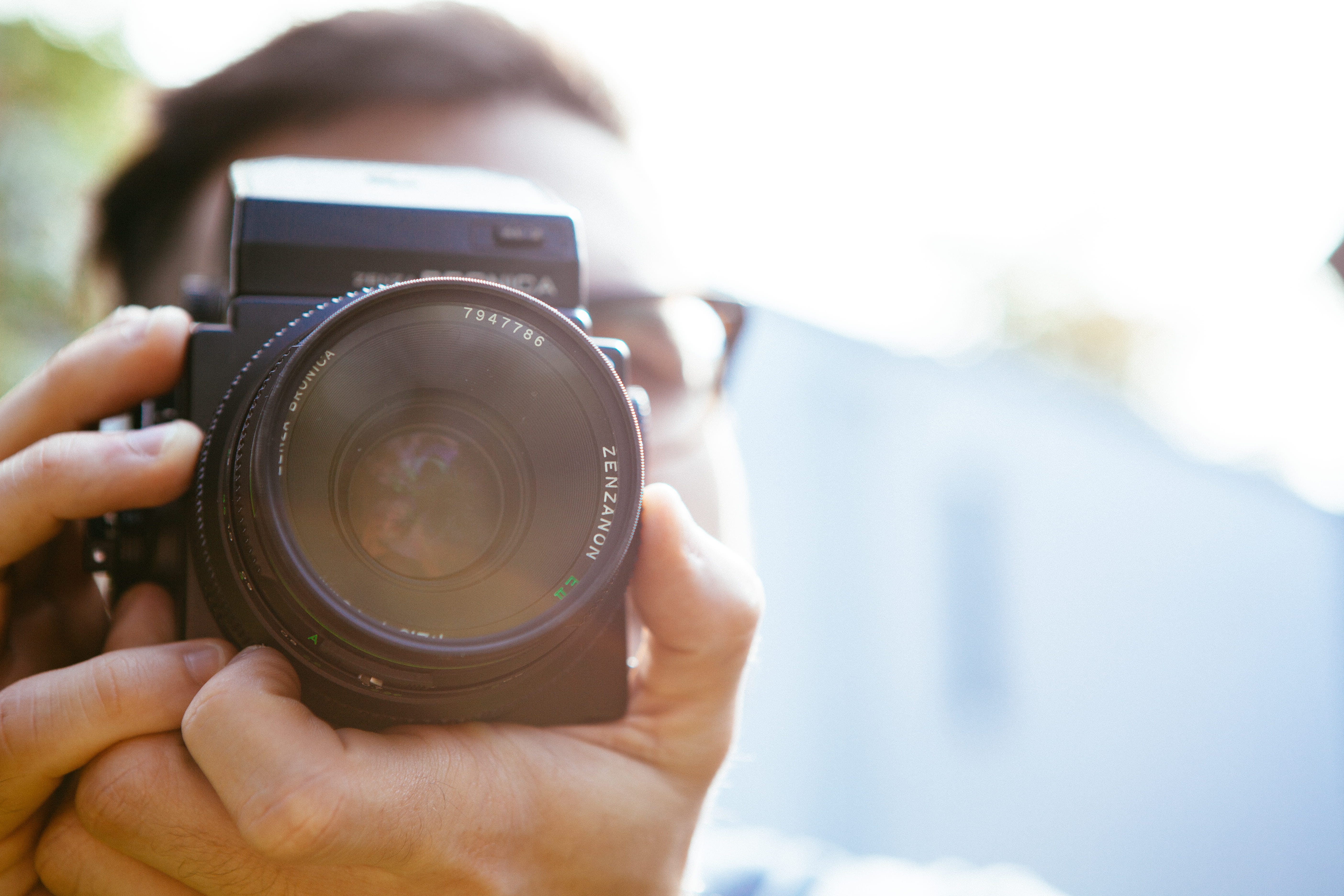 slr camera, technology, one person, photographic equipment, taking photo, human hand, young adult, 5K, bronica, outdoors, day, photographer, digital camera, HD Wallpaper