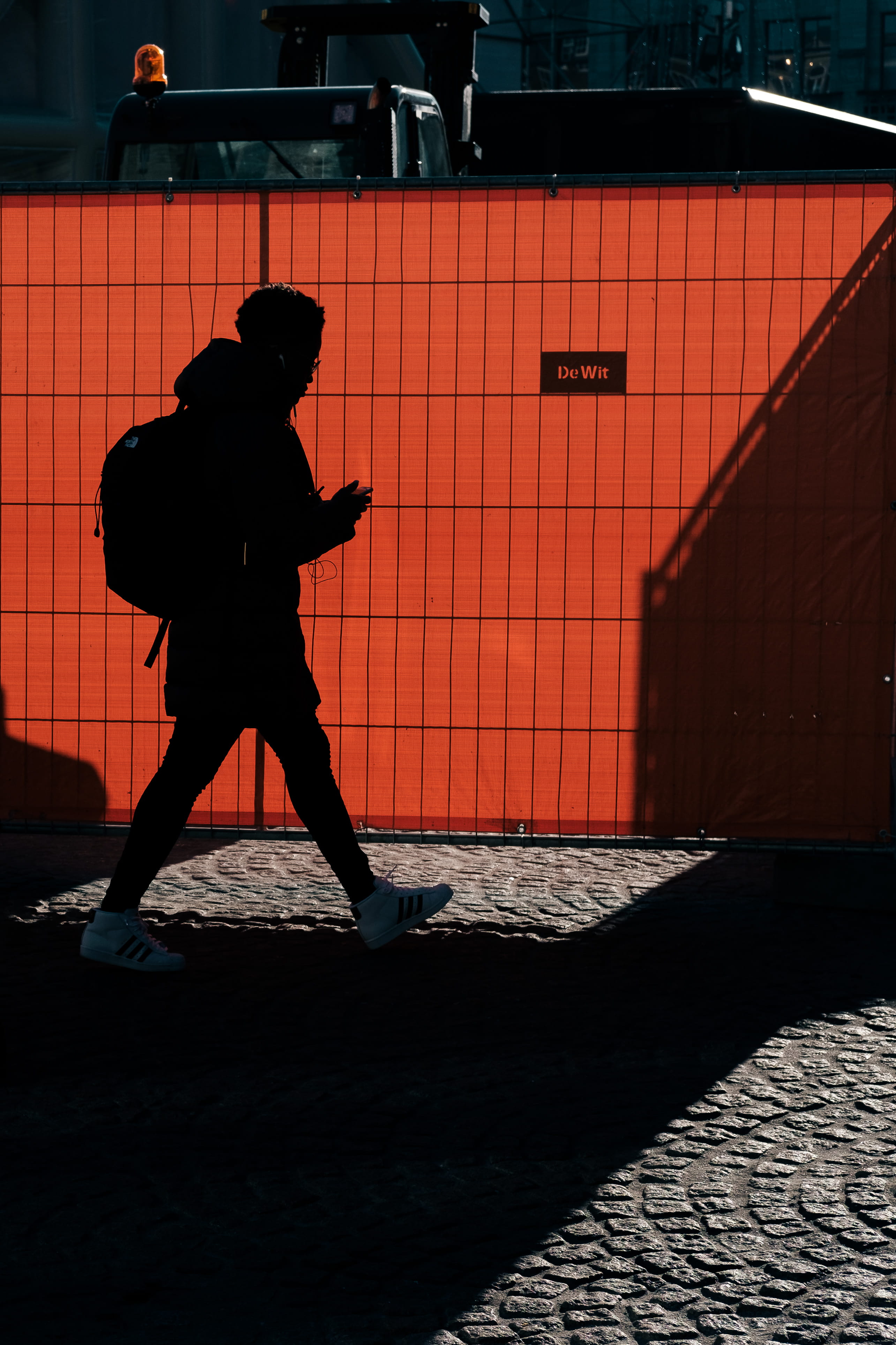 architecture, silhouette, walking, day, footwear, fireman, cobblestone, gray, city, brown, side view, human, outdoors, concrete, apparel, leisure activity, Phone HD Wallpaper