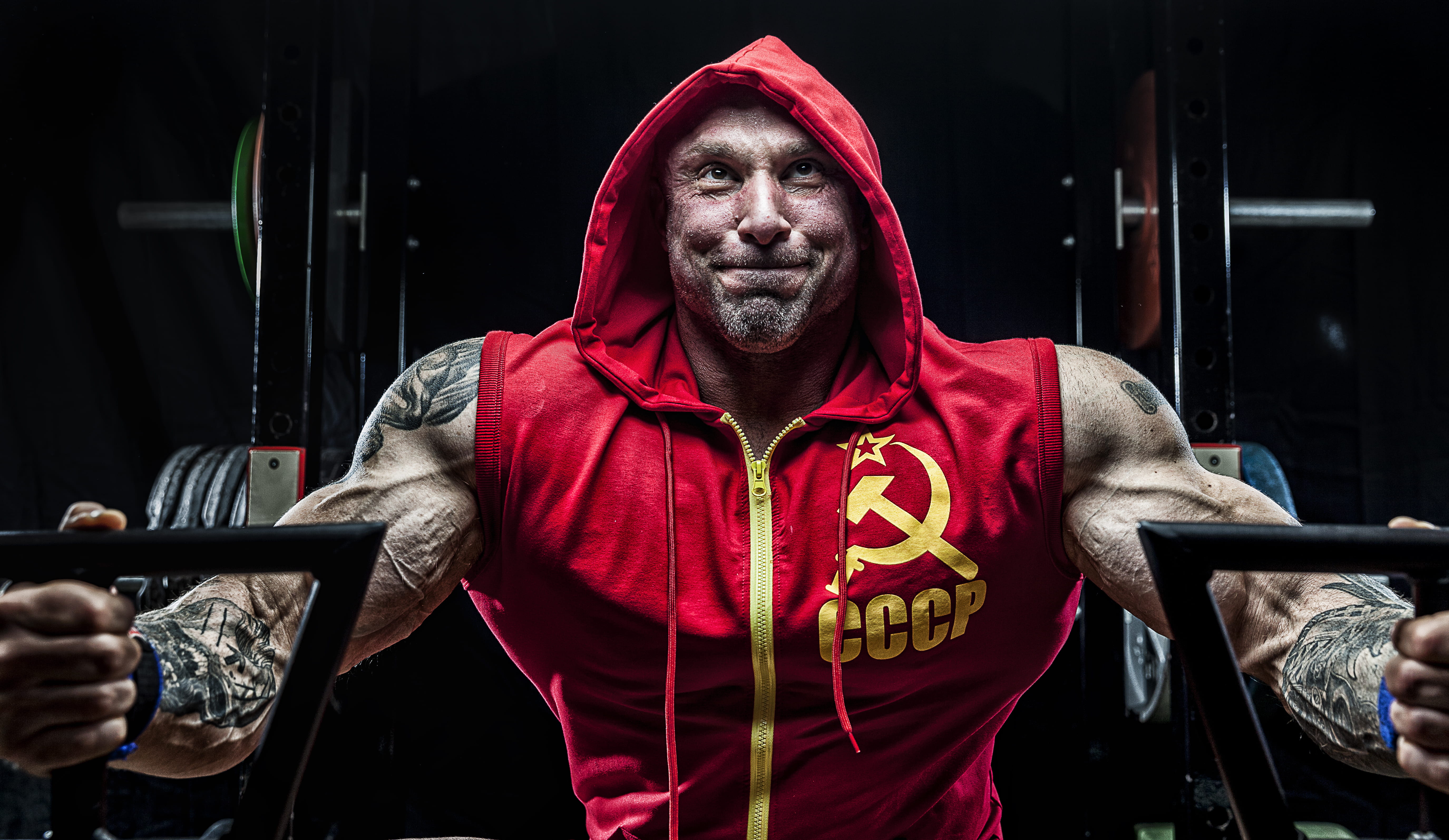 hood, waist up, real people, lifestyles, standing, man, one person, tattoo, yellow, indoors, looking at camera, men, red, hood - clothing, mid adult, adult, HD Wallpaper