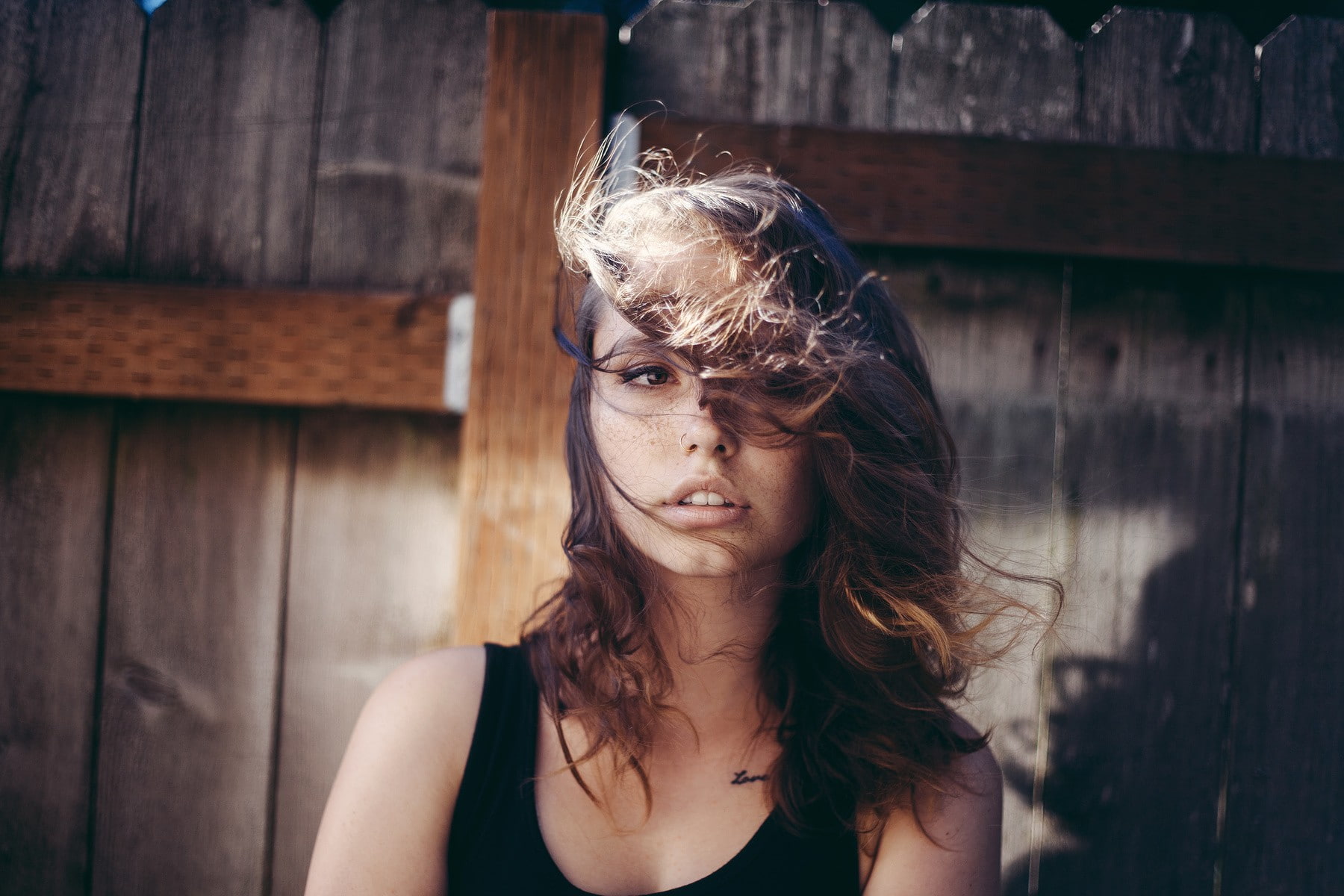 windy, focus on foreground, Skye Thompson, front view, Ruby James, women, long hair, portrait, adult, wood - material, beautiful woman, fence, lifestyles, HD Wallpaper
