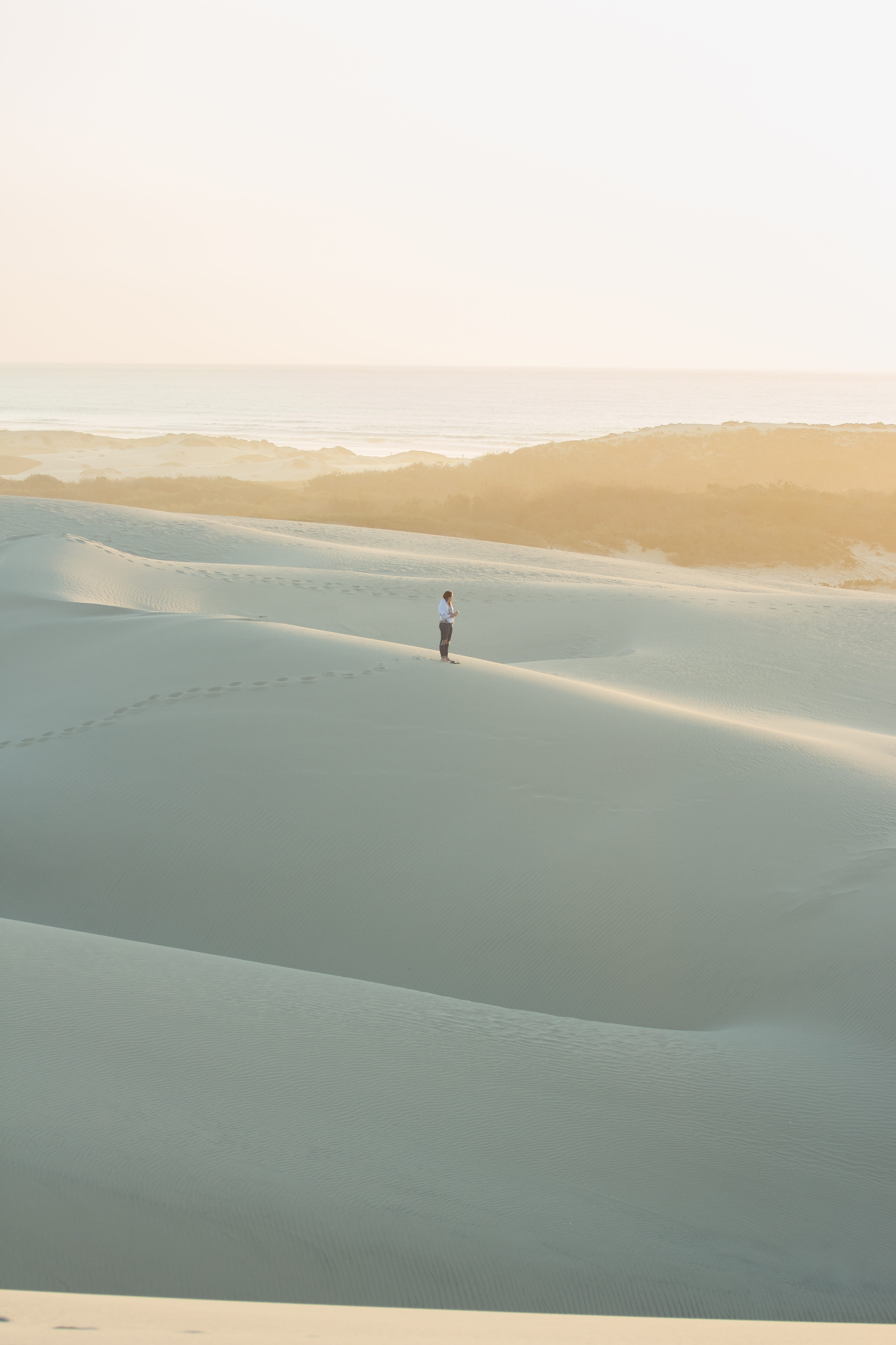 mist, 5K, footprints, landscape, sand, distant, one person, copy space, daytime, beauty in nature, desert, idyllic, man, water, nature, looking at view, Phone HD Wallpaper