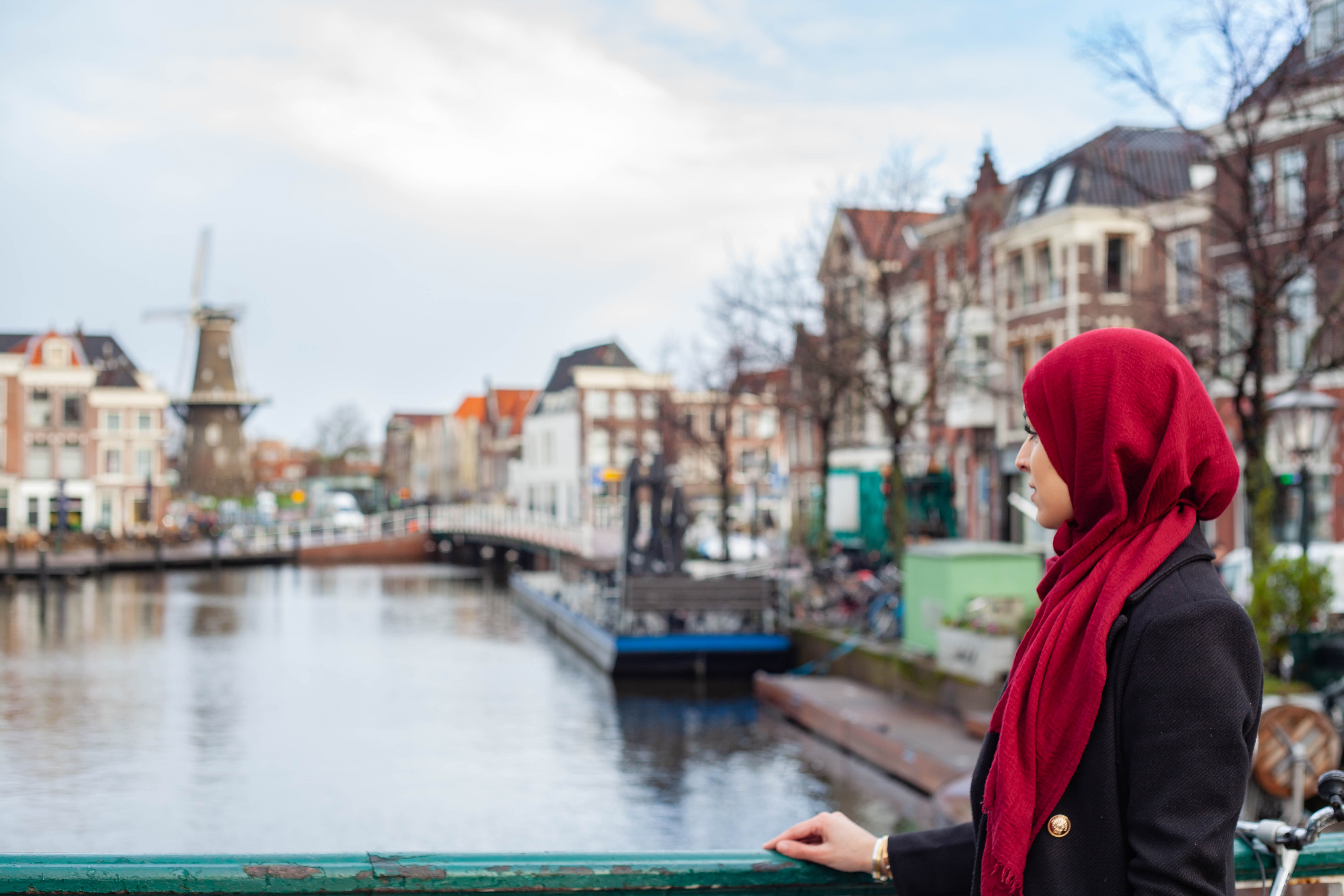transportation, women, concrete, building, outdoors, canal, girl, woman, muslim, side view, netherlands, windmill, waist up, hijab, cityscape, street, trees, HD Wallpaper
