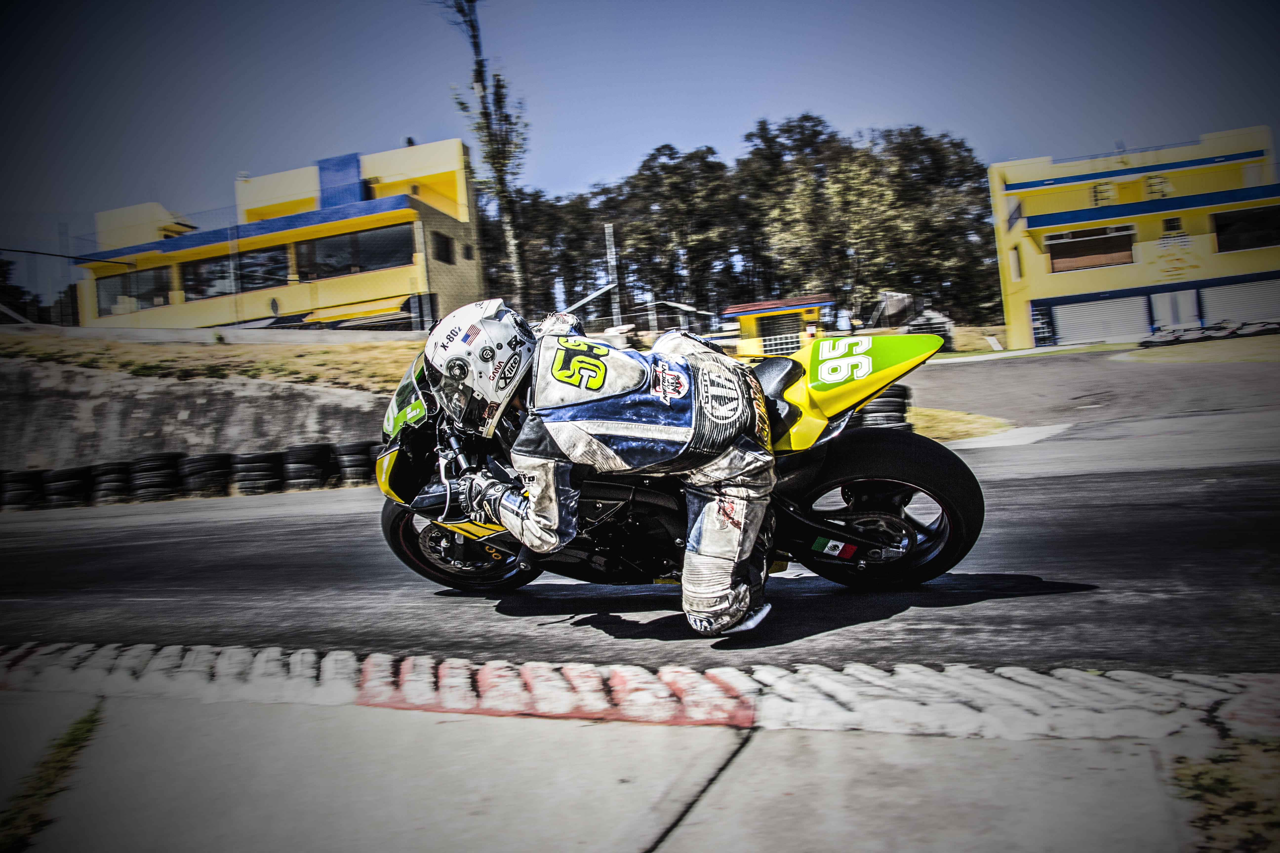 buildings, motorcycle, racer, helmet, motor vehicle, wheels, plant, driver, crash helmet, nature, mode of transportation, sport, fast, sports, machine, HD Wallpaper
