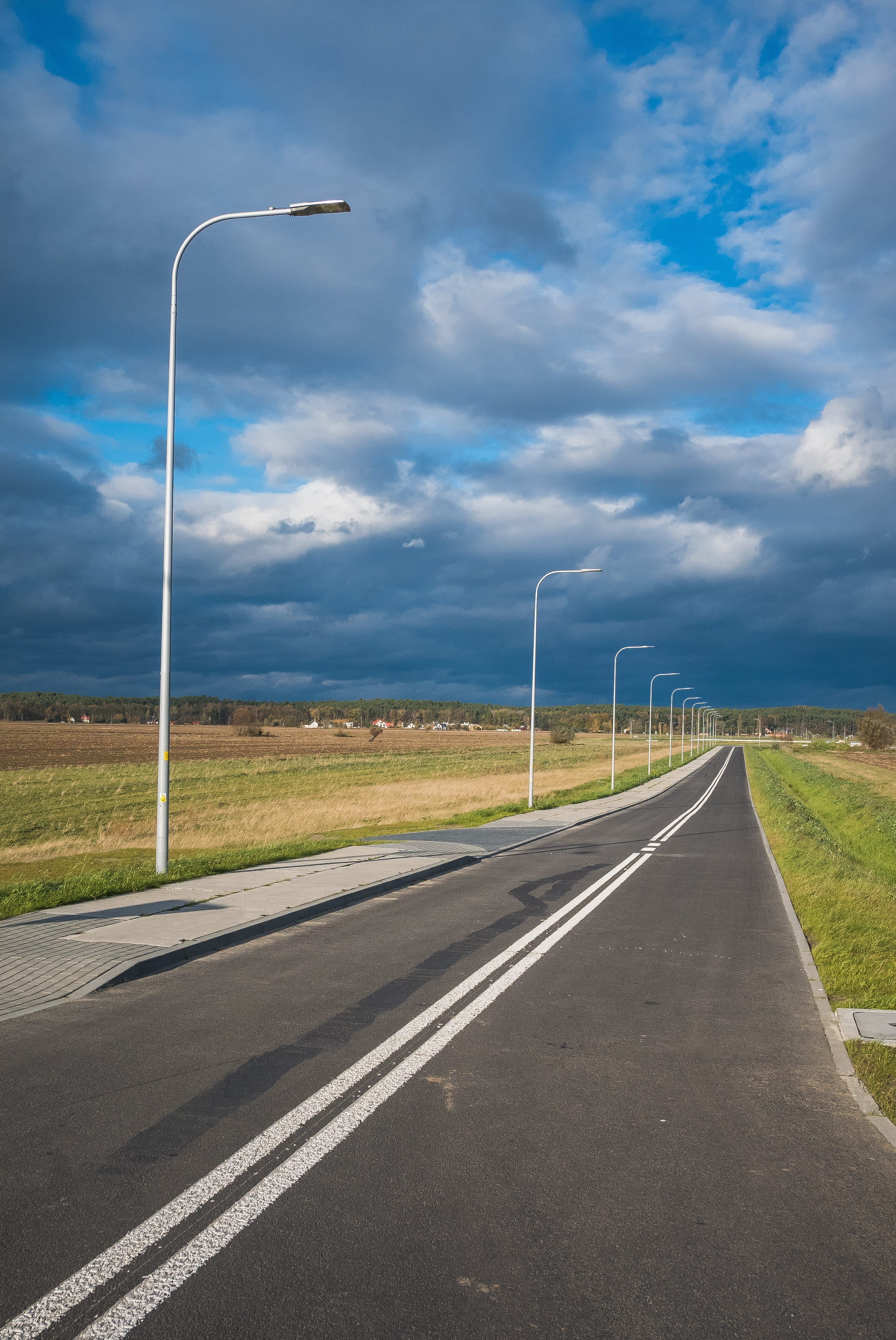 transportation, country road, cloud - sky, transport, traffic, outdoors, clouds, beeline, travel, track, pavement, 4K, path, drive, dividing line, street light, Phone HD Wallpaper