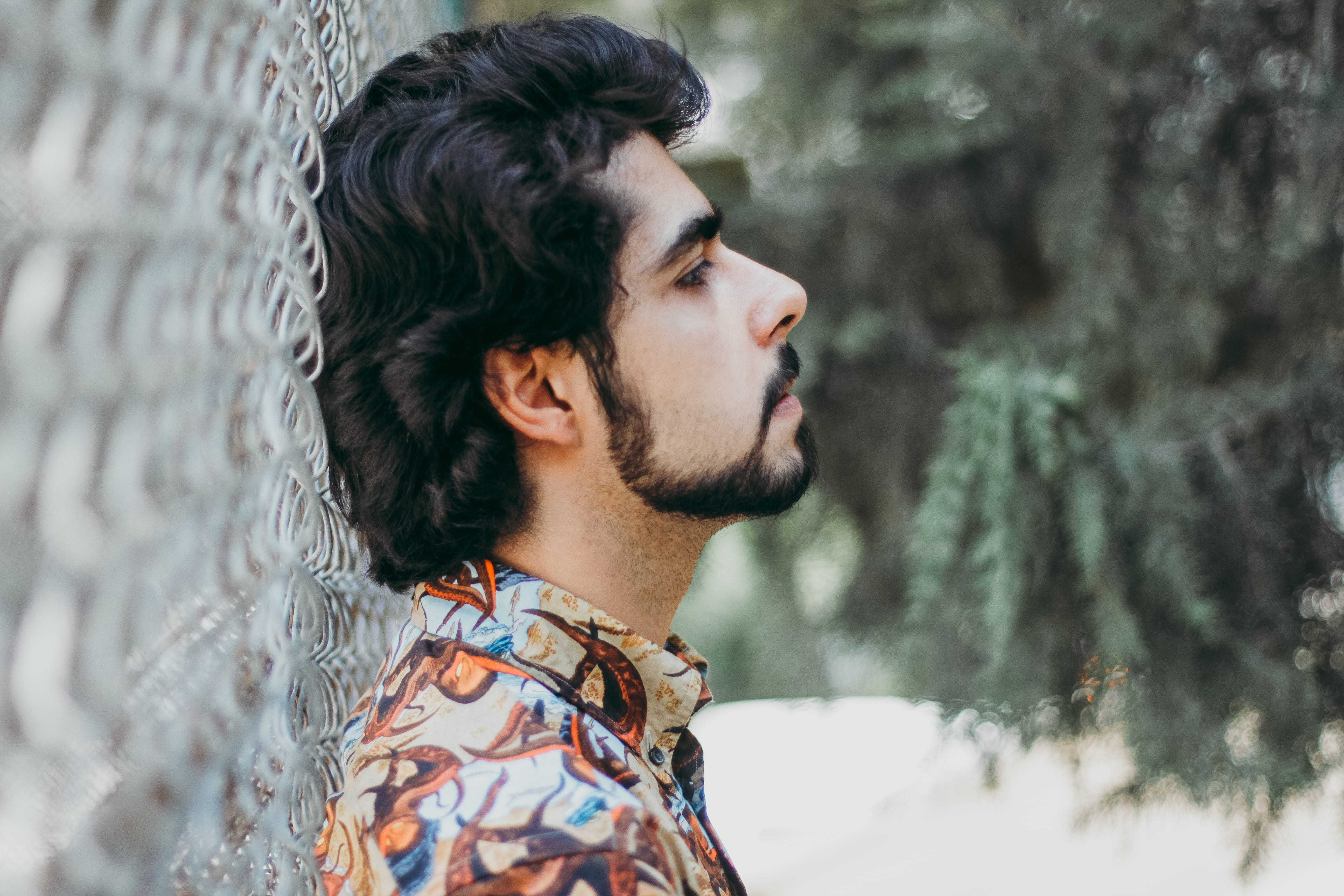 wearing, profile view, handsome, man, collar, adult, buttons, trees, headshot, shirt, chain link fence, hipster - person, hairstyle, serious, contemplation, HD Wallpaper