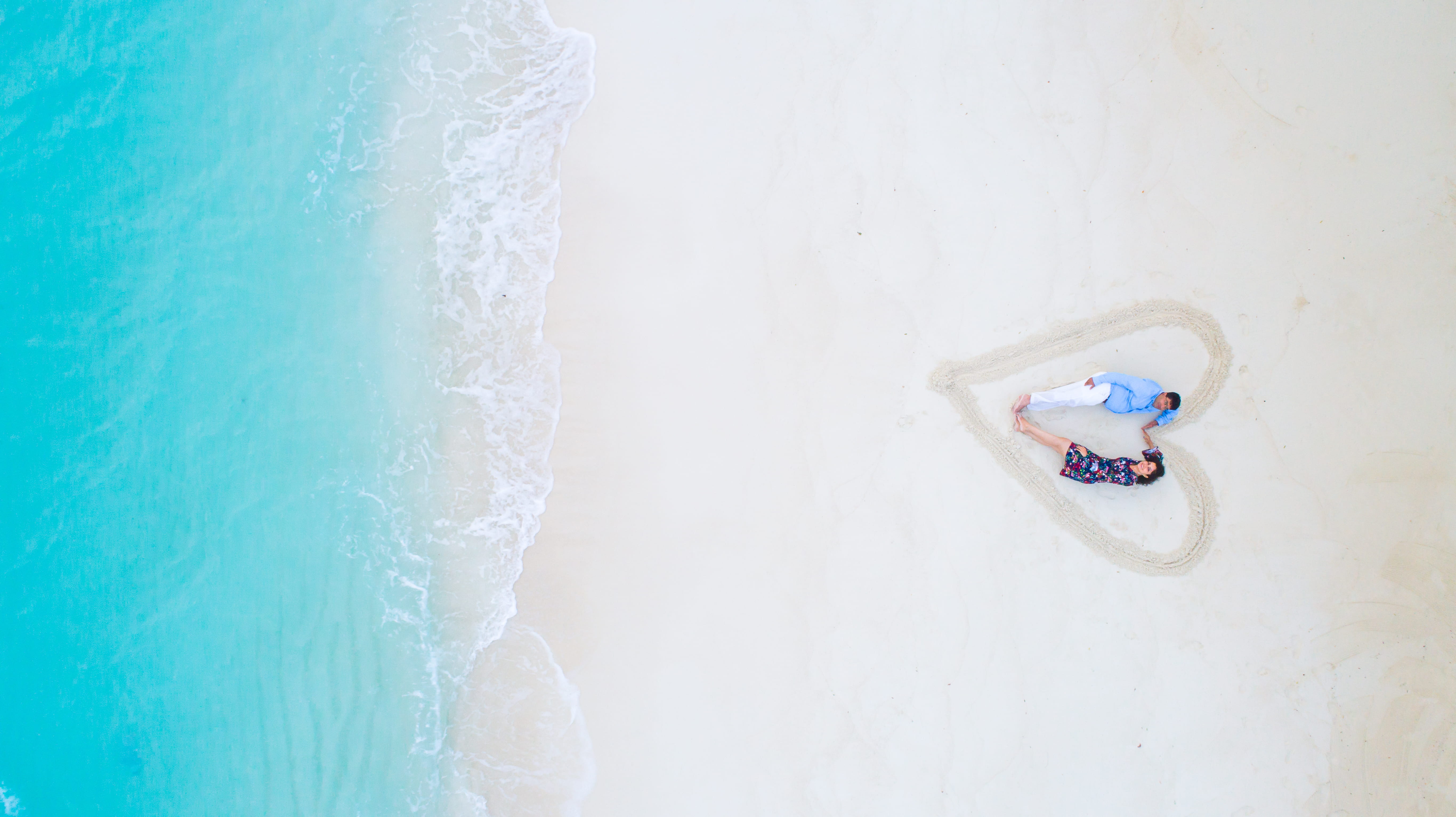 young couple, sand, maldives, man, shore, white, sport, high angle view, white color, sea, 5K, lying, people, beach, day, near, couple, aquatic sport, HD Wallpaper