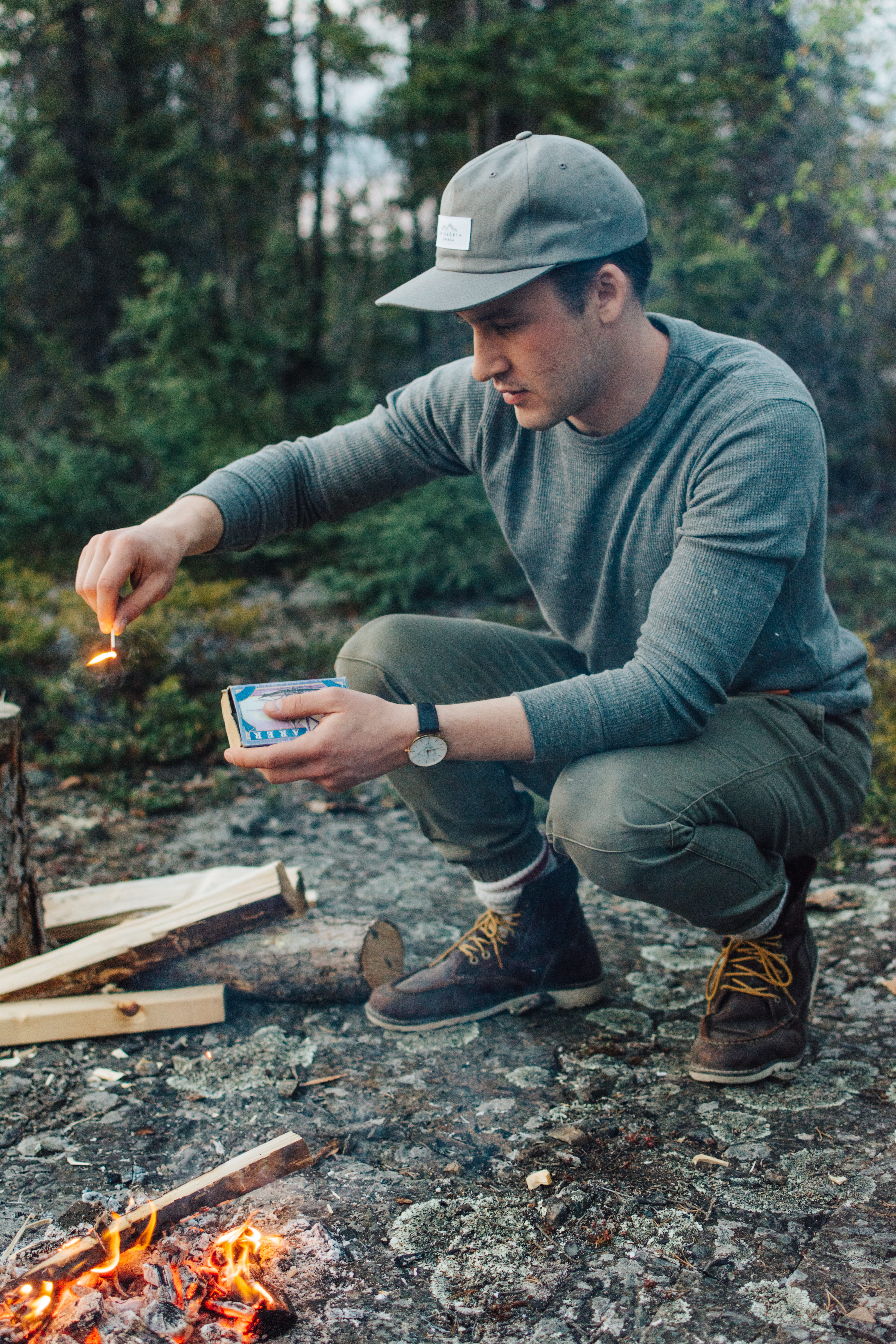 bonfire, forest, woods, fire, men, young, holding, one person, man, nature, adventure, hat, watch, day, leisure activity, looking, ducking, outdoors, lit, Phone HD Wallpaper