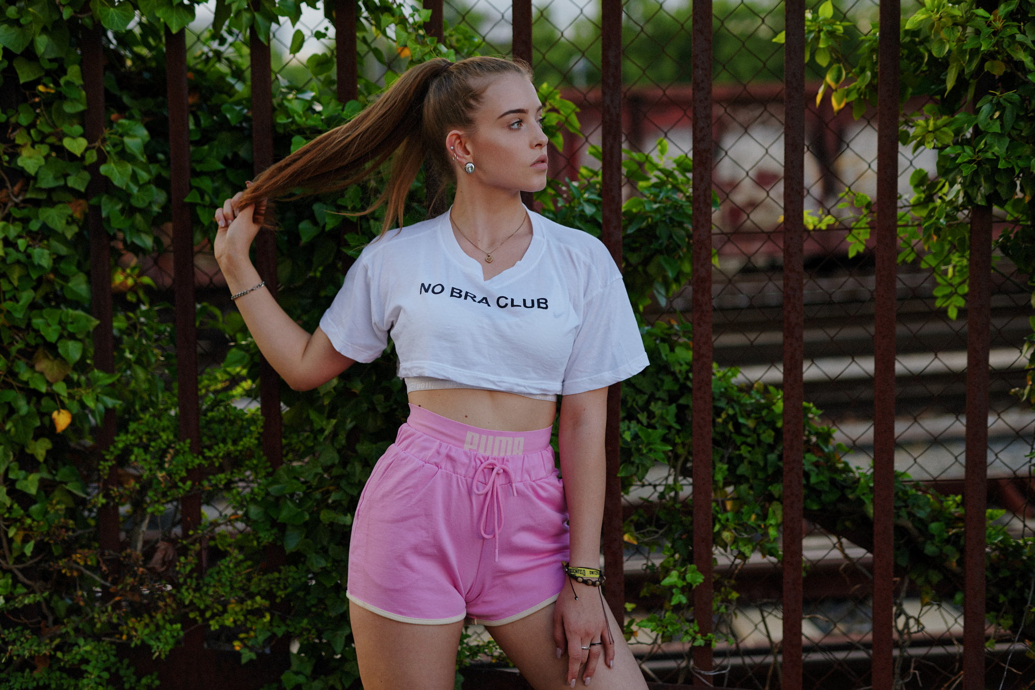 growth, T-shirt, women outdoors, casual clothing, 1080P, three quarter length, real people, lifestyles, green color, portrait, front view, lie, one person, HD Wallpaper