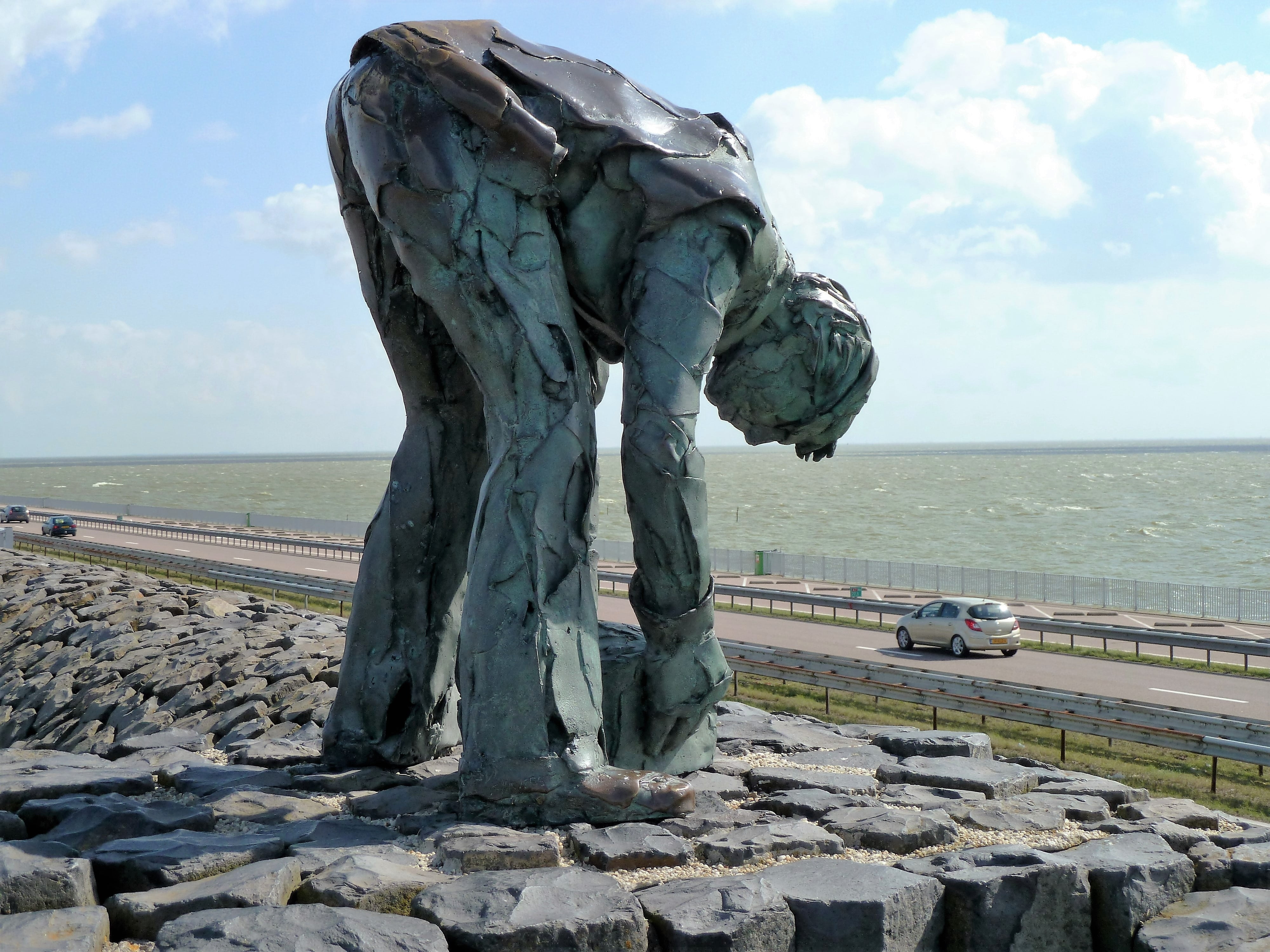 labor, horizon over water, land, statue, 4K, representation, cloud - sky, water, beach, work, tranquil scene, sculpture, outdoors, beauty in nature, dyke, HD Wallpaper