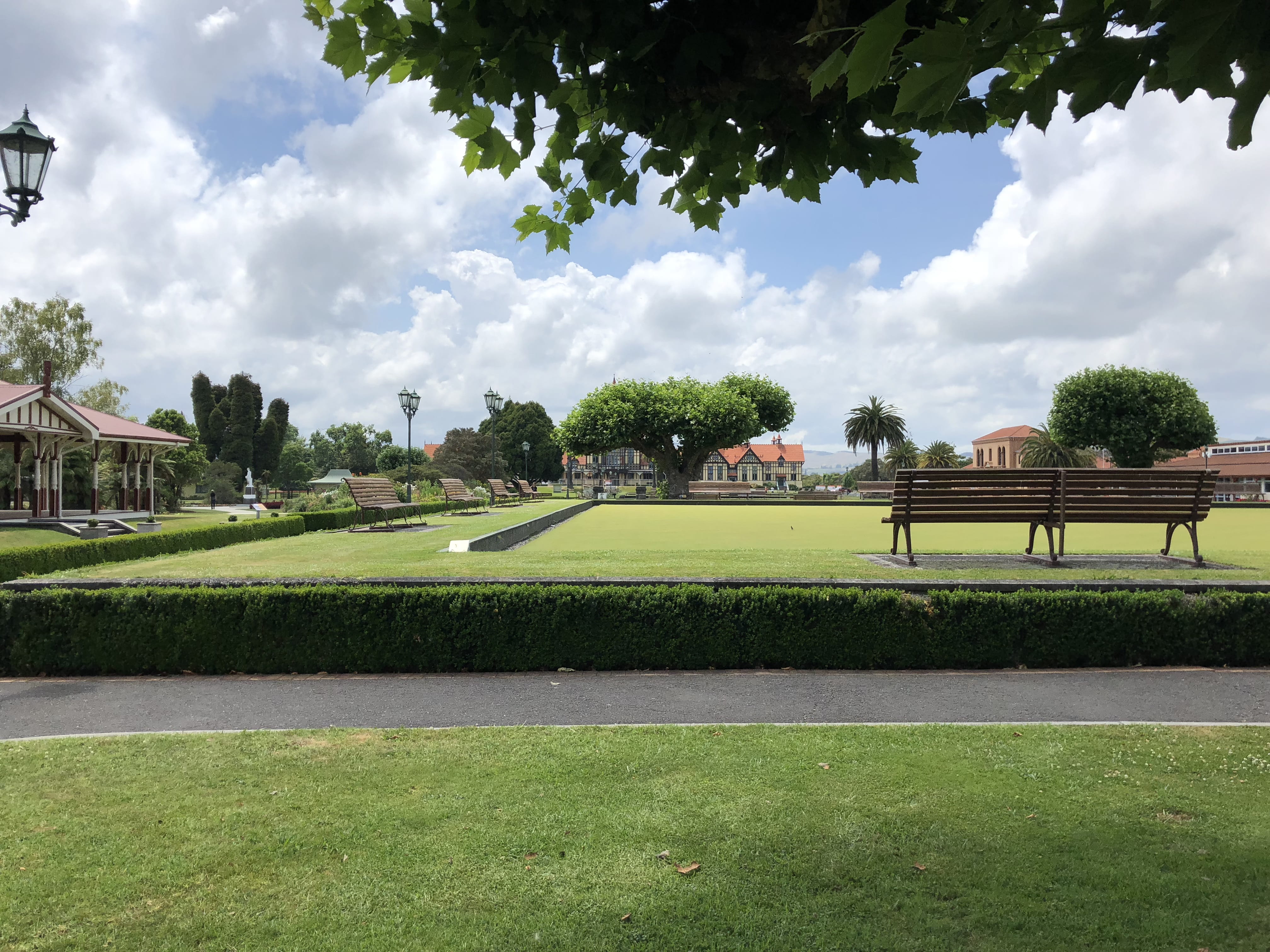 overcoat, cloud - sky, beauty in nature, park bench, grass, green color, 4K, hedge, tree trunk, apparel, tree, built structure, bench, architecture, 1061 haupapa st, HD Wallpaper