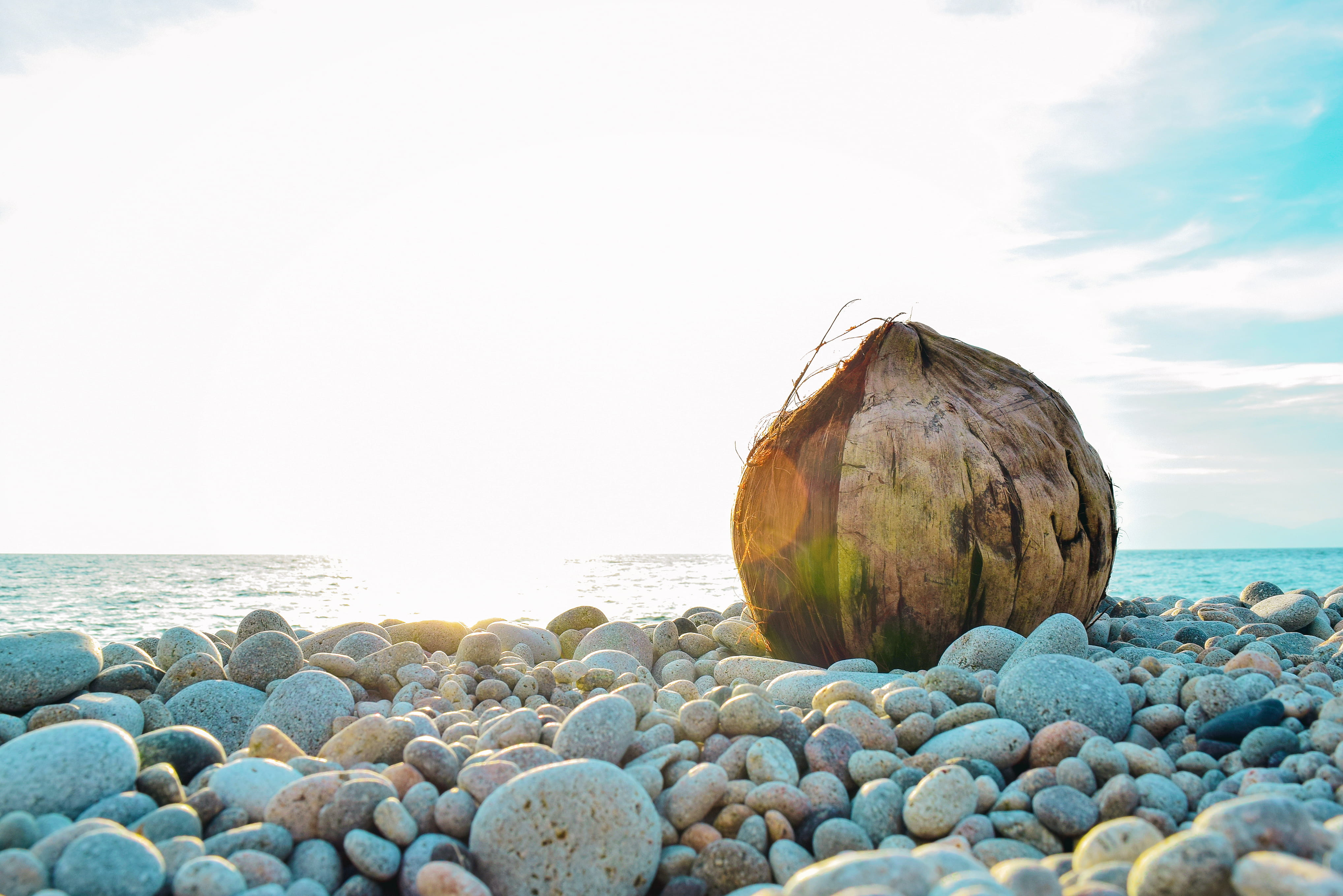 4K, stone, sea, looc beach, beauty in nature, scenics - nature, solid, beach, pebbles, outdoors, tranquility, sky, rock, sunset, cloud - sky, coconut, HD Wallpaper