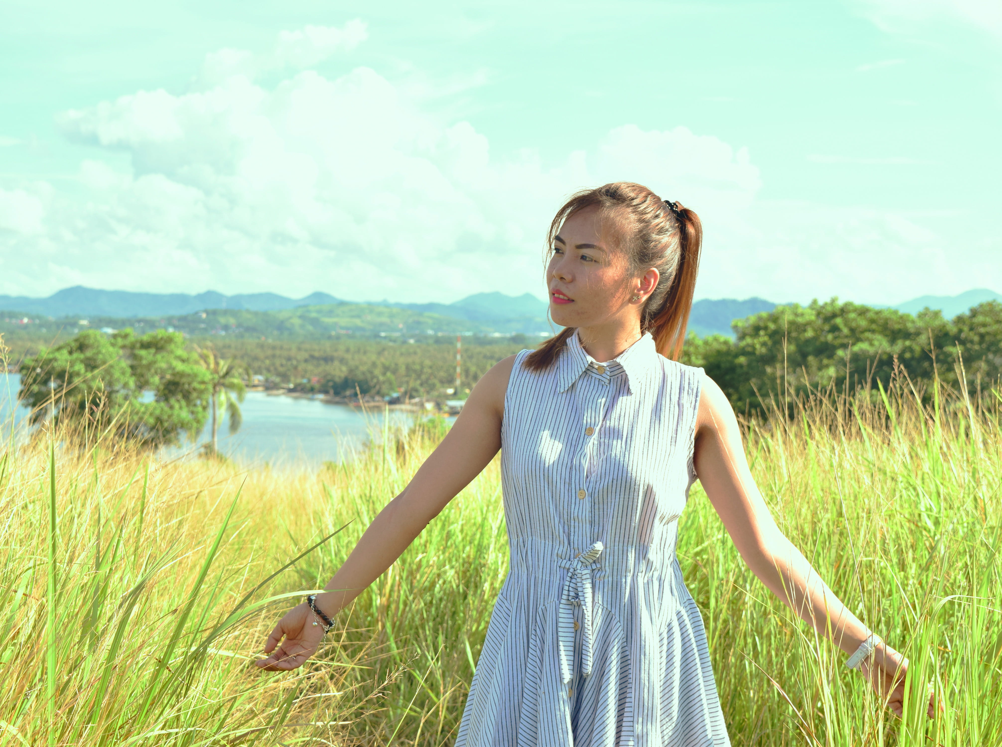 hairstyle, land, standing, outdoors, beautiful woman, fashion, lipata, plant, women, day, young adult, growth, real people, grass, landscape, grass field, HD Wallpaper