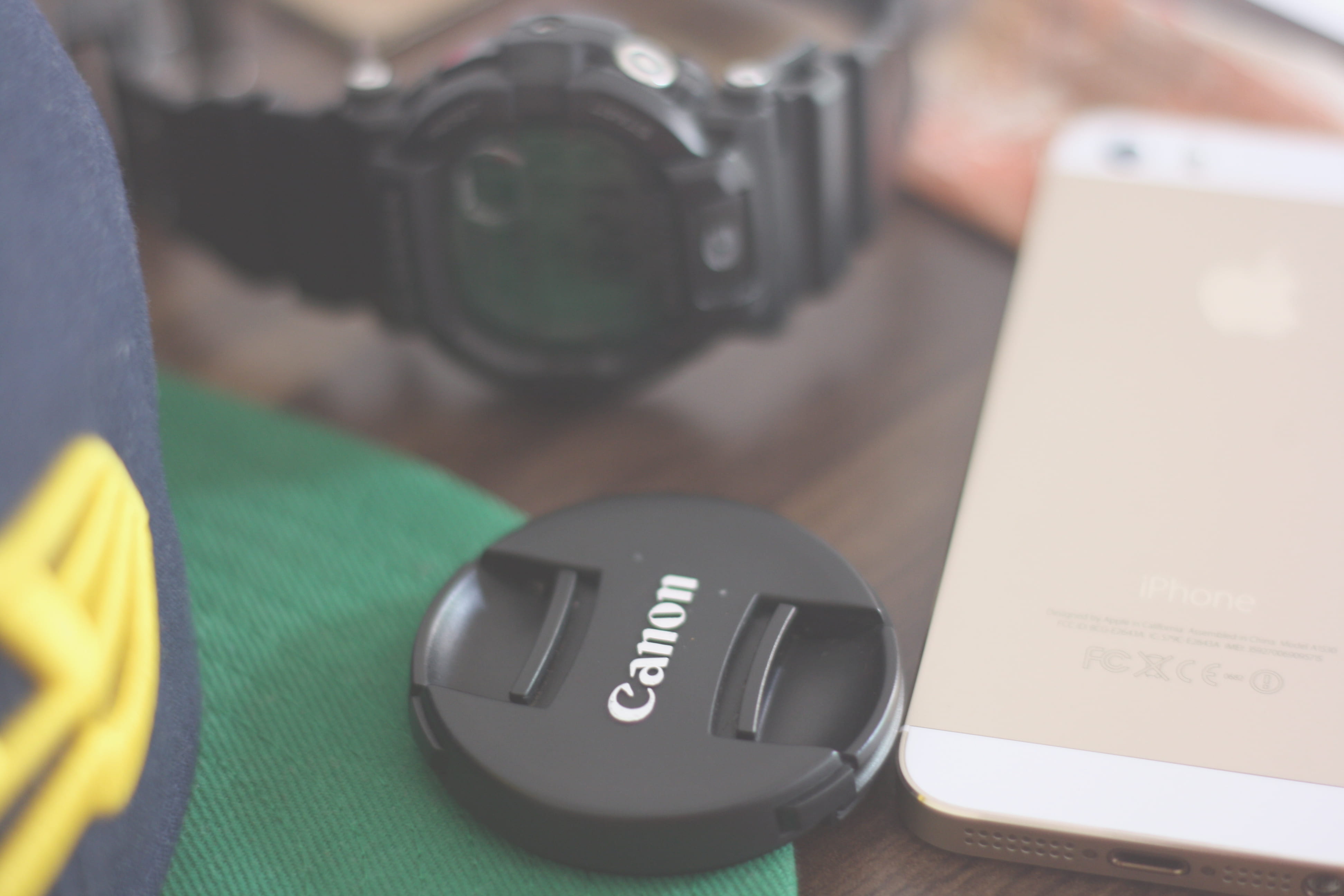 western script, technology, canon, shock, gold, adult, mobile phone, indoors, g, wireless technology, one person, wristwatch, casio, close-up, camera - photographic equipment, HD Wallpaper