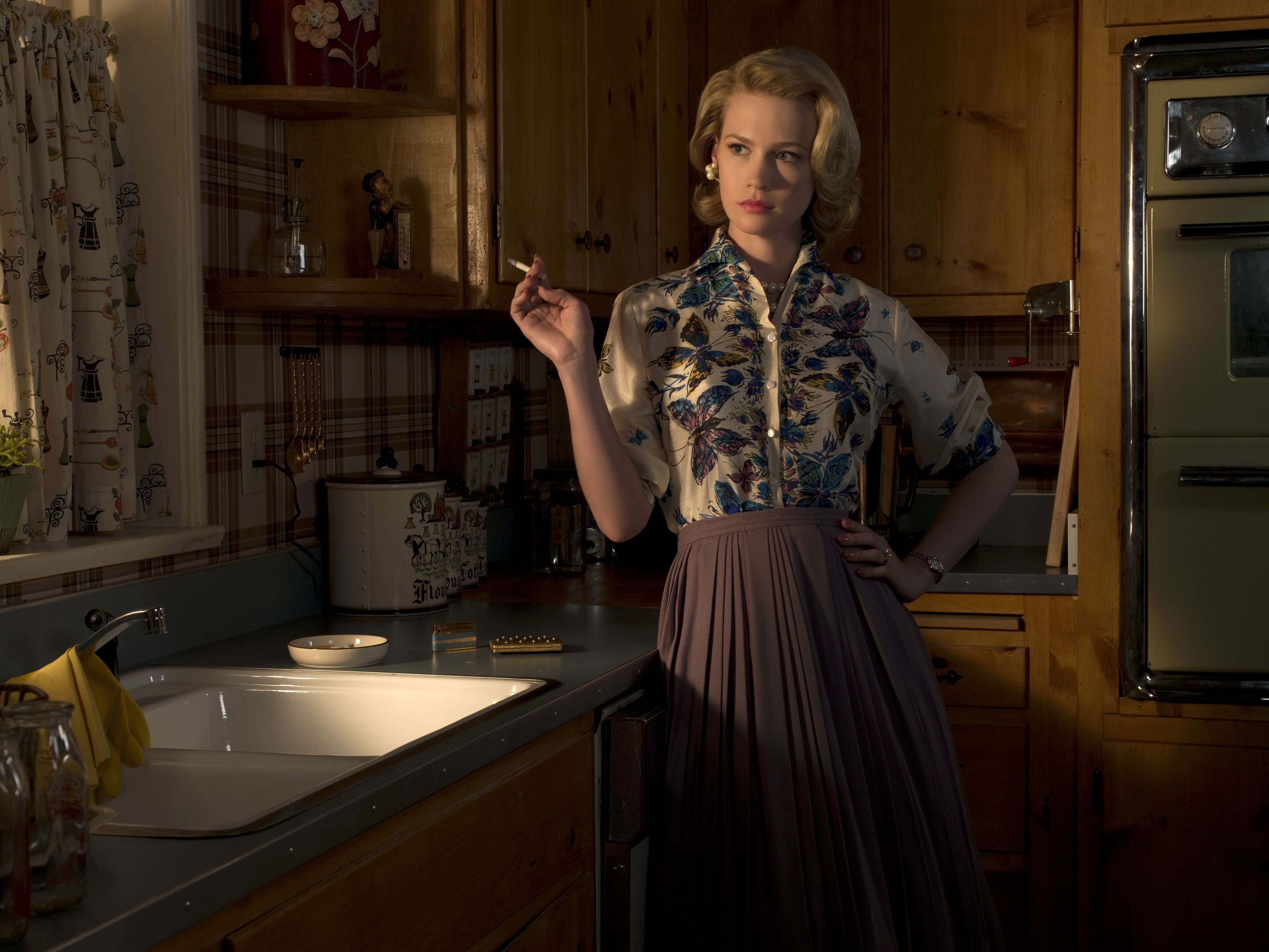 beautiful woman, mad men, young adult, cabinet, looking at camera, domestic kitchen, hairstyle, domestic room, lifestyles, 2K, portrait, kitchen, standing, HD Wallpaper