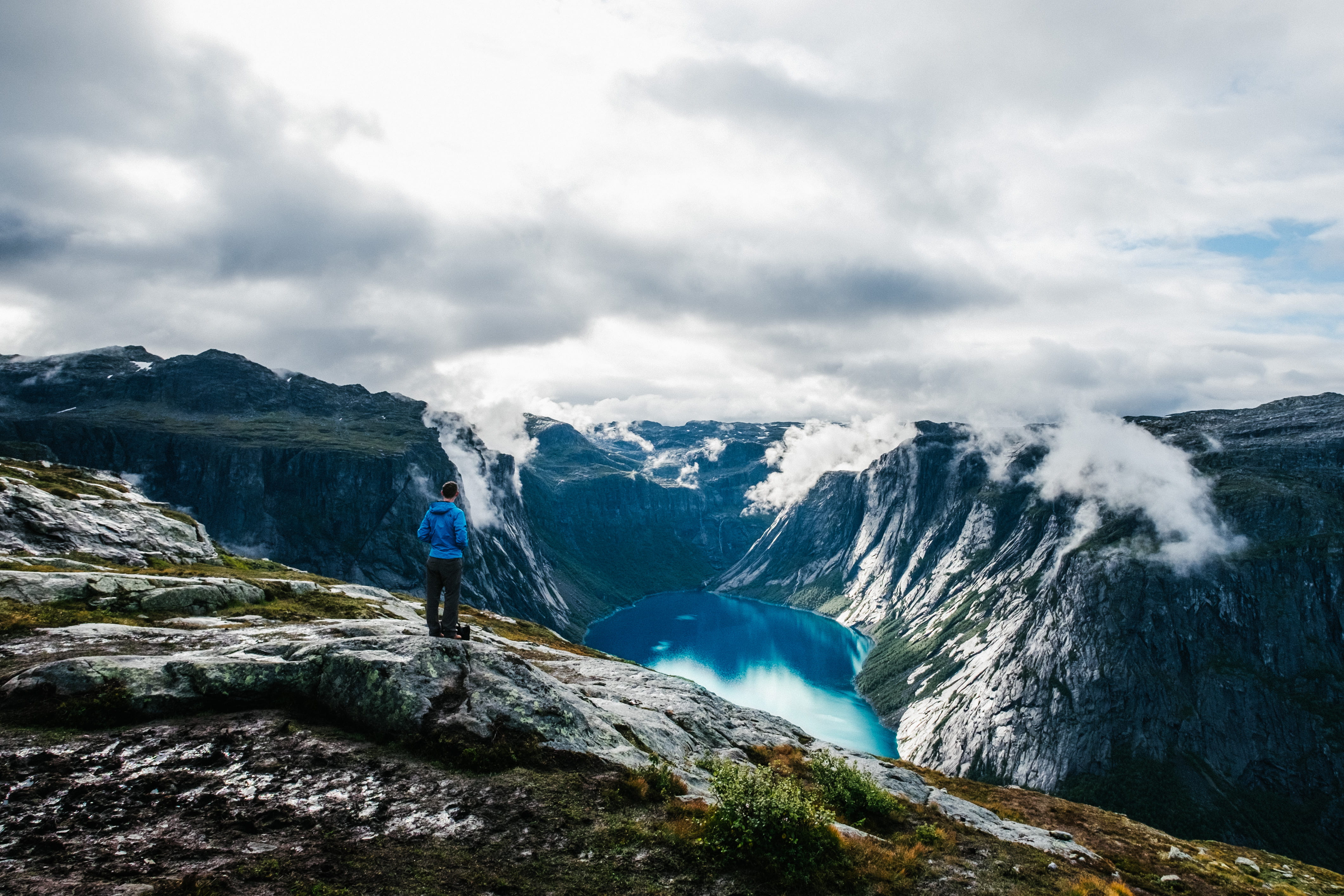 jacket, blue, lake, winter, male, standing, another, cold temperature, landscape, cliff, cloud - sky, hill, outdoors, wearing, mountain, fog, valley, rock, HD Wallpaper