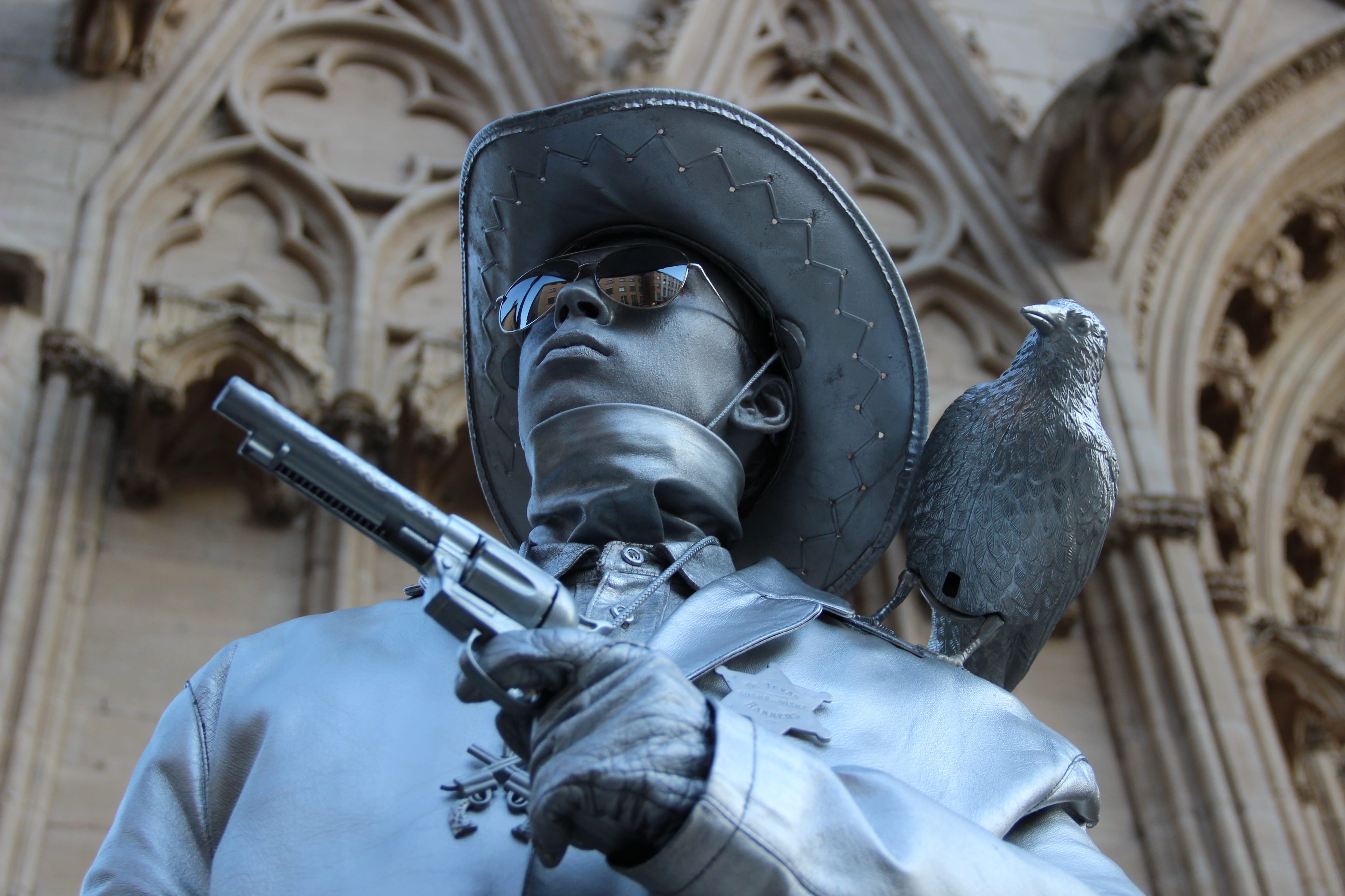 sculptures, focus on foreground, headshot, day, holding, person, headwear, military, hat, outdoors, weapon, daylight, sunglasses, focus, gun, rifle, man, HD Wallpaper