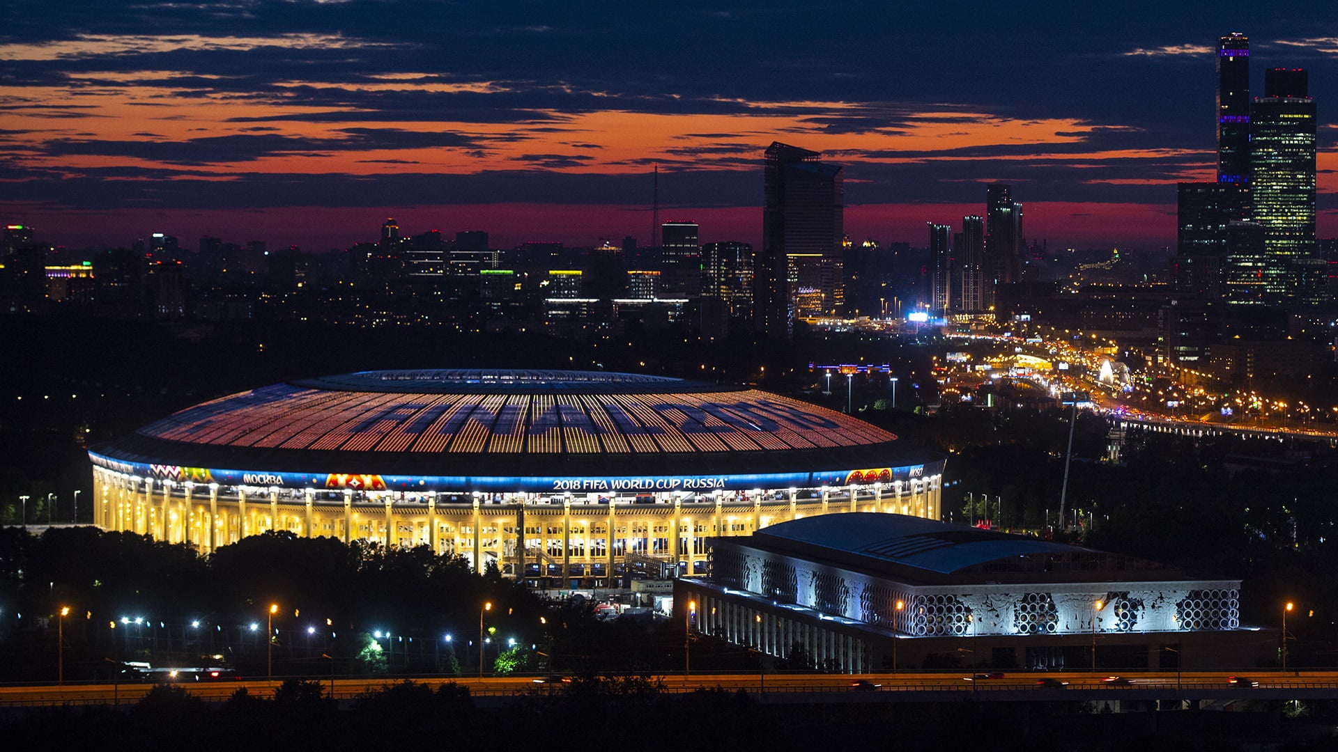 illuminated, 2018 world cup, nature, high angle view, metropolis, skyscraper, stadium, world cup, outdoors, travel destinations, building exterior, cloud - sky, HD Wallpaper