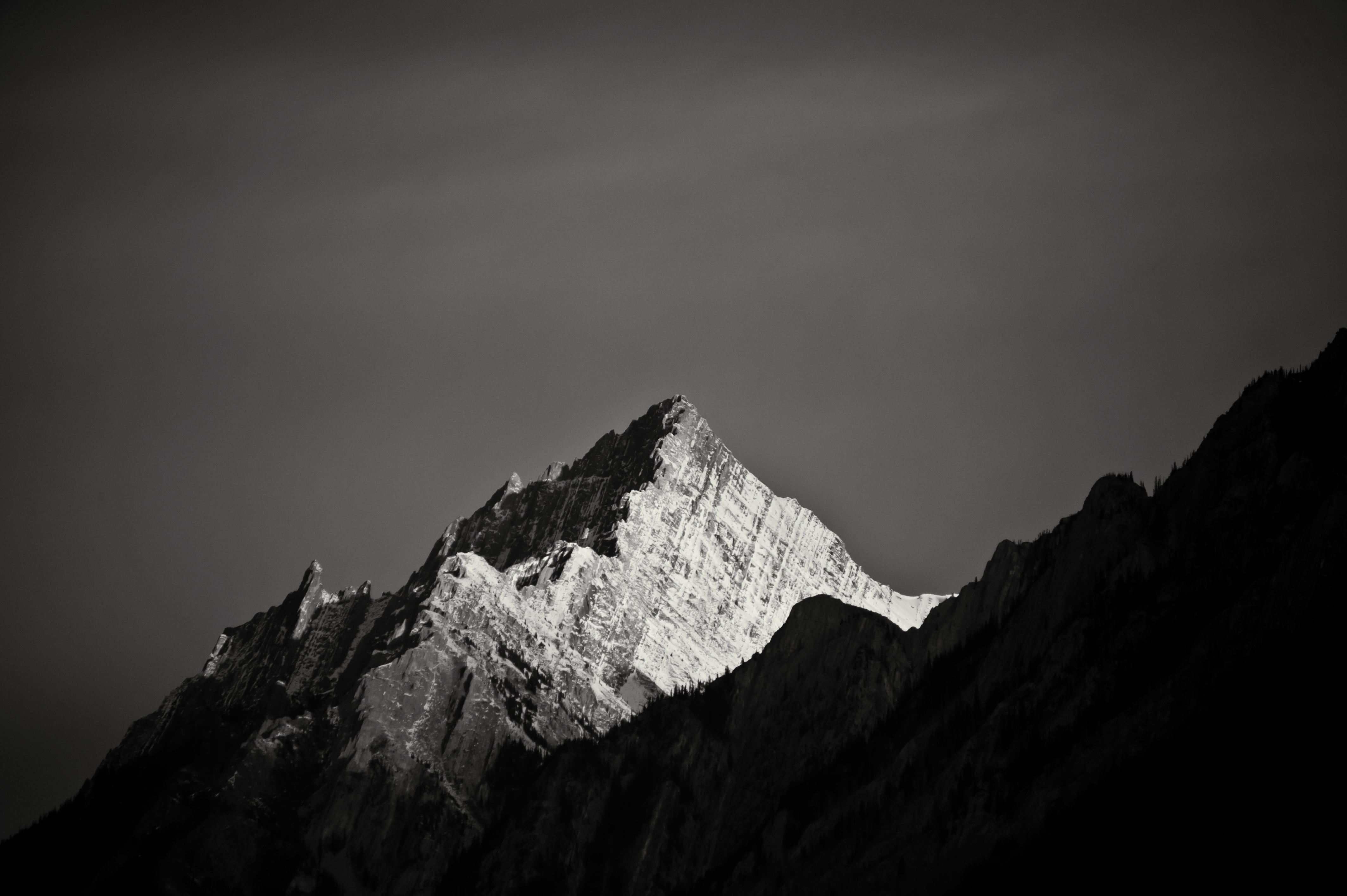 nature, mountain range, tranquil scene, tranquility, physical geography, 4K, mountain peak, mountain, snowcapped mountain, sky, rock, low angle view, grayscale, HD Wallpaper