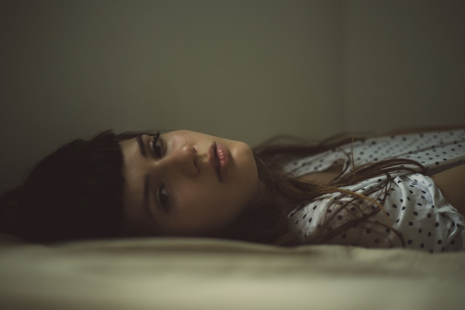 polka dots, in bed, lying down, brunette, women, looking at viewer, 720P, HD Wallpaper